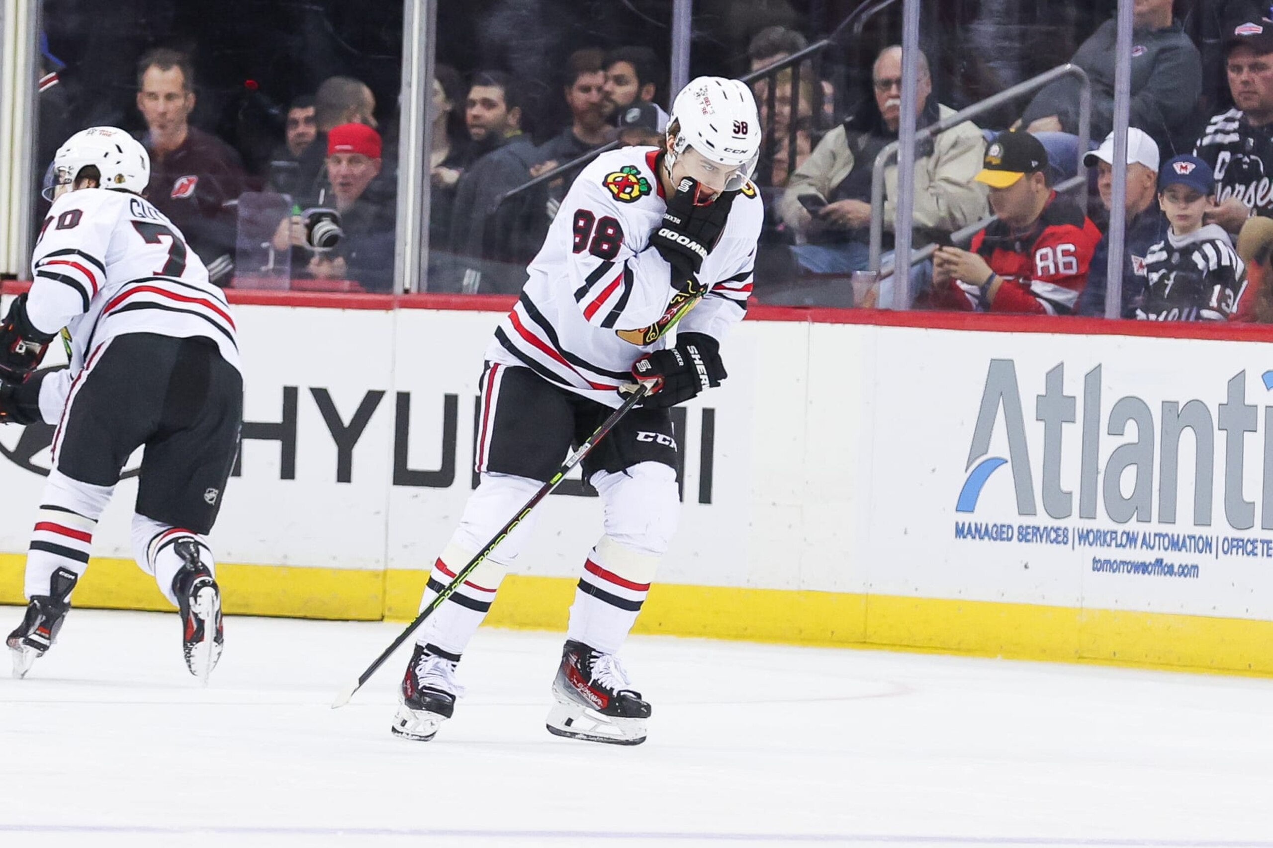 NEWARK, NJ - JANUARY 05: Chicago Blackhawks center Connor Bedard (98) skates off after being hit during a game between the Chicago Blackhawks and New Jersey Devils on January 05, 2024 at Prudential Center in the Newark, New Jersey. (Photo by Andrew Mordzynski/Icon Sportswire via Getty Images) NEWARK, NJ - JANUARY 05: Chicago Blackhawks center Connor Bedard (98) skates off after being hit during a game between the Chicago Blackhawks and New Jersey Devils on January 05, 2024 at Prudential Center in the Newark, New Jersey. (Photo by Andrew Mordzynski/Icon Sportswire via Getty Images)
