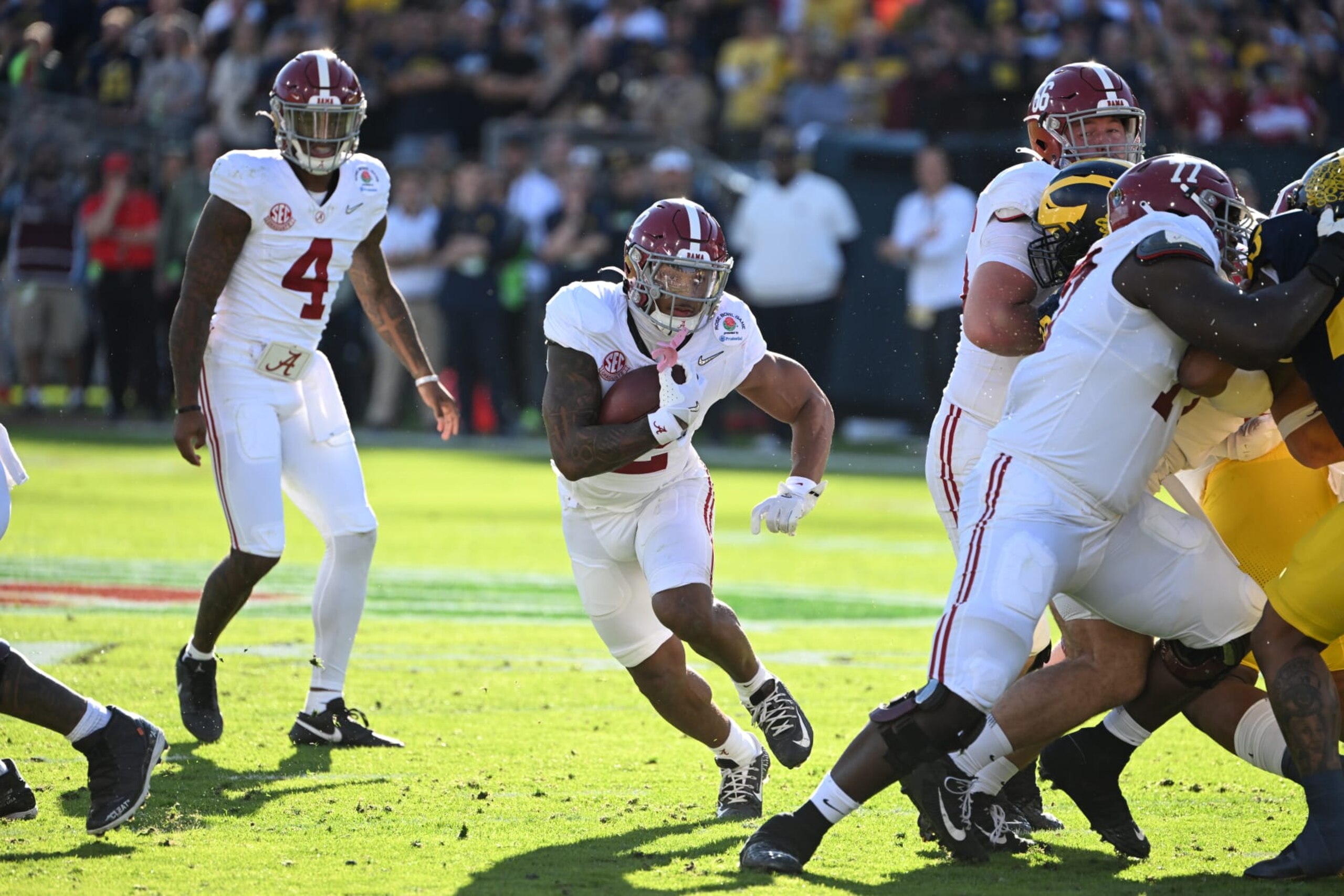 PASADENA, CA - JANUARY 01: RB Jase McClellan (2) of the Alabama Crimson Tide scores on a  34-yard touchdown for a 7-0 Alabama lead during the Alabama Crimson Tide game versus the Michigan Wolverines CFP Semifinal at the Rose Bowl Game on January, 1, 2024, at the Rose Bowl Stadium in Pasadena, CA. (Photo by John Cordes/Icon Sportswire via Getty Images)