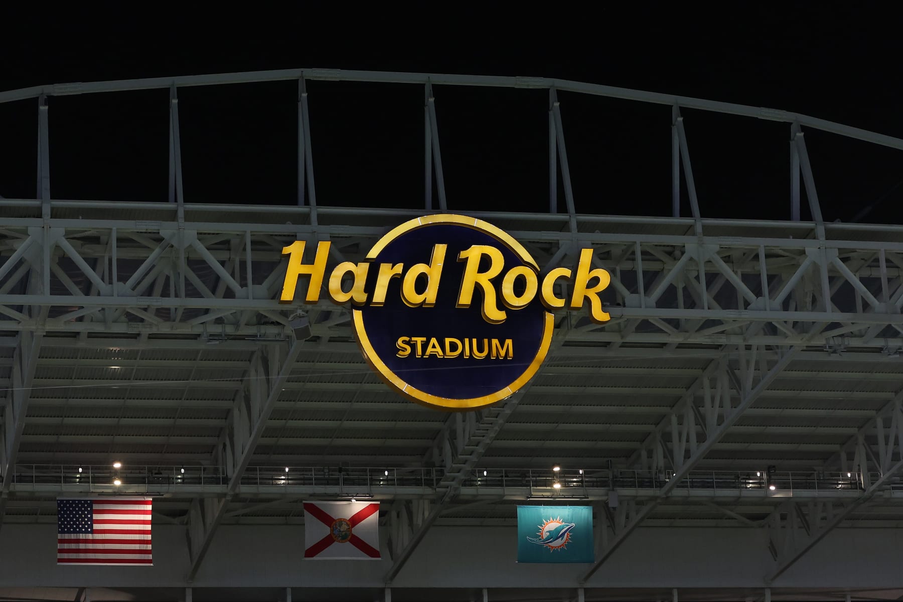 MIAMI GARDENS, FLORIDA - DECEMBER 24: A detailed view of the Hard Rock Stadium sign during a game between the Miami Dolphins and the Dallas Cowboys at Hard Rock Stadium on December 24, 2023 in Miami Gardens, Florida.  The Dolphins defeated the Cowboys 22-20. (Photo by Stacy Revere/Getty Images)