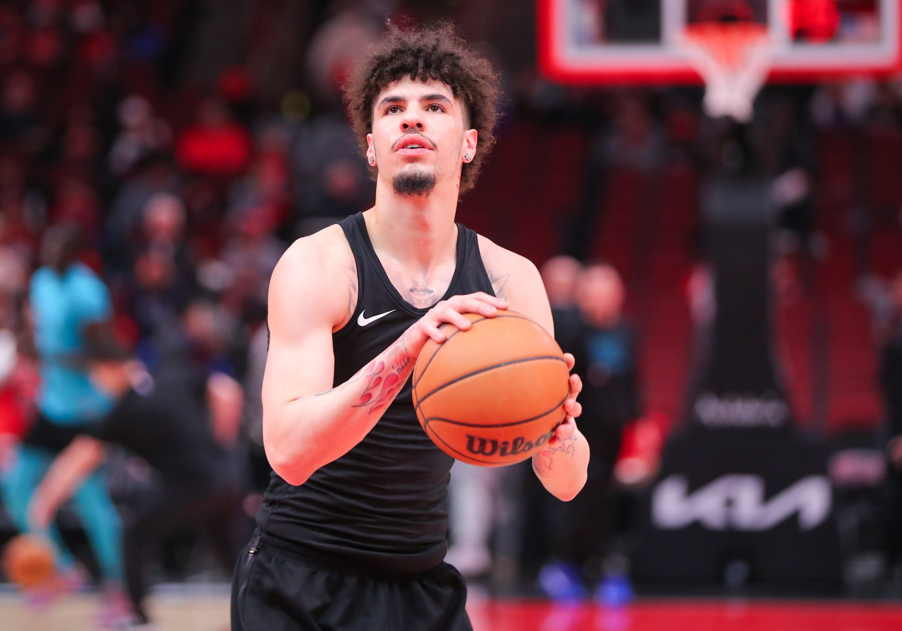 CHICAGO, IL - JANUARY 05: LaMelo Ball #1 of the Charlotte Hornets looks on before attempting a free throw
prior to a game against the Chicago Bulls at United Center on January 05, 2024 in Chicago, Illinois. (Photo by Melissa Tamez/Icon Sportswire via Getty Images)