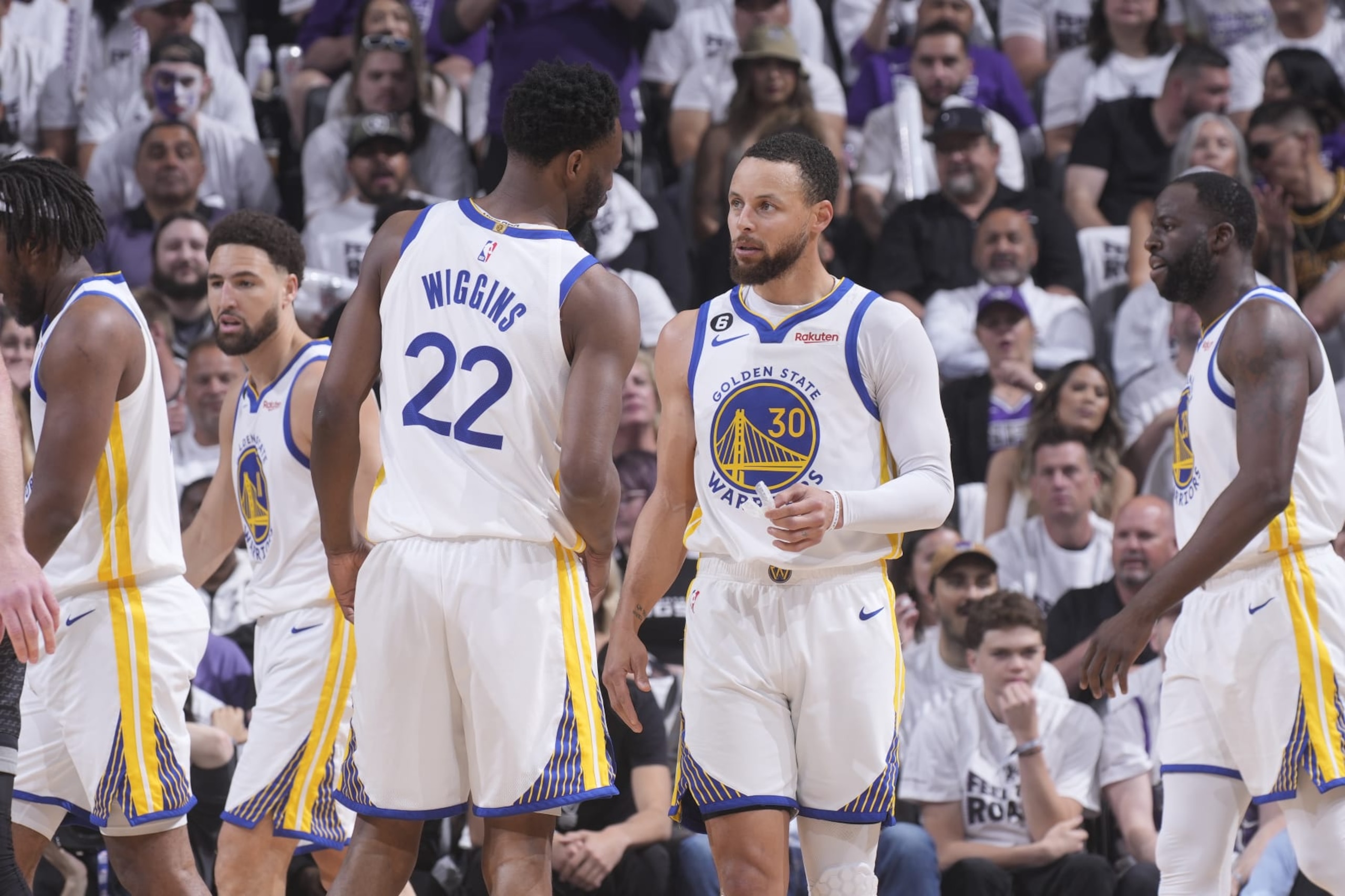 SACRAMENTO, CA - APRIL 30: Andrew Wiggins #22 and Stephen Curry #30 of the Golden State Warriors talk during the game against the Sacramento Kings during Round 1 Game 7 of the 2023 NBA Playoffs on April 30, 2023 at Golden 1 Center in Sacramento, California. NOTE TO USER: User expressly acknowledges and agrees that, by downloading and or using this photograph, User is consenting to the terms and conditions of the Getty Images Agreement. Mandatory Copyright Notice: Copyright 2023 NBAE (Photo by Rocky Widner/NBAE via Getty Images) SACRAMENTO, CA - APRIL 30: Andrew Wiggins #22 and Stephen Curry #30 of the Golden State Warriors talk during the game against the Sacramento Kings during Round 1 Game 7 of the 2023 NBA Playoffs on April 30, 2023 at Golden 1 Center in Sacramento, California. NOTE TO USER: User expressly acknowledges and agrees that, by downloading and or using this photograph, User is consenting to the terms and conditions of the Getty Images Agreement. Mandatory Copyright Notice: Copyright 2023 NBAE (Photo by Rocky Widner/NBAE via Getty Images)