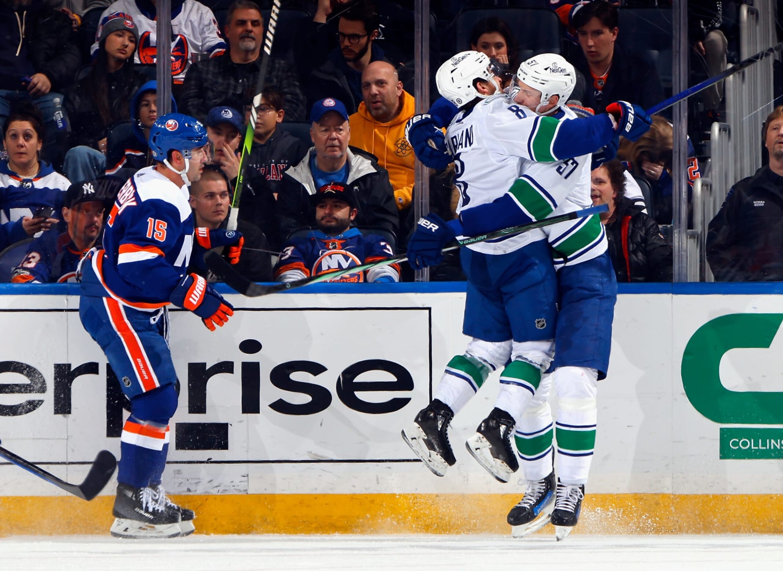 ELMONT, NEW YORK - JANUARY 09: Tyler Myers #57 of the Vancouver Canucks scores at 17:54 of the second period against the New York Islanders and is joined by Conor Garland #8 at UBS Arena on January 09, 2024 in Elmont, New York. (Photo by Bruce Bennett/Getty Images) ELMONT, NEW YORK - JANUARY 09: Tyler Myers #57 of the Vancouver Canucks scores at 17:54 of the second period against the New York Islanders and is joined by Conor Garland #8 at UBS Arena on January 09, 2024 in Elmont, New York. (Photo by Bruce Bennett/Getty Images)
