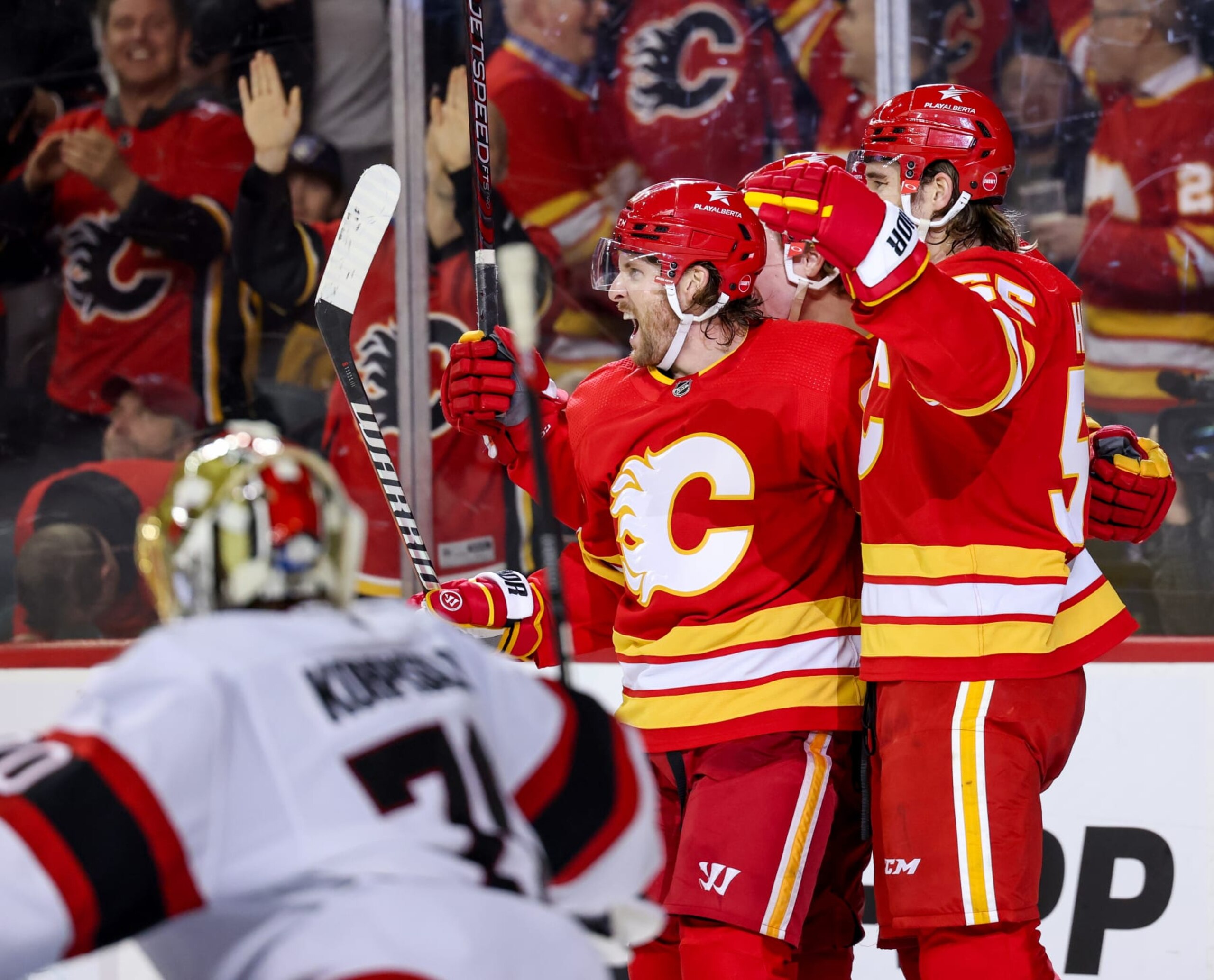CALGARY, CANADA - JANUARY 9: Blake Coleman #20 of the Calgary Flames celebrates his goal on the Ottawa Senators with teammates Noah Hanifin #55 of the Calgary Flames during the third period at the Scotiabank Saddledome on January 9, 2024 in Calgary, Alberta, Canada. (Photo by Leah Hennel/Getty Images) CALGARY, CANADA - JANUARY 9: Blake Coleman #20 of the Calgary Flames celebrates his goal on the Ottawa Senators with teammates Noah Hanifin #55 of the Calgary Flames during the third period at the Scotiabank Saddledome on January 9, 2024 in Calgary, Alberta, Canada. (Photo by Leah Hennel/Getty Images)