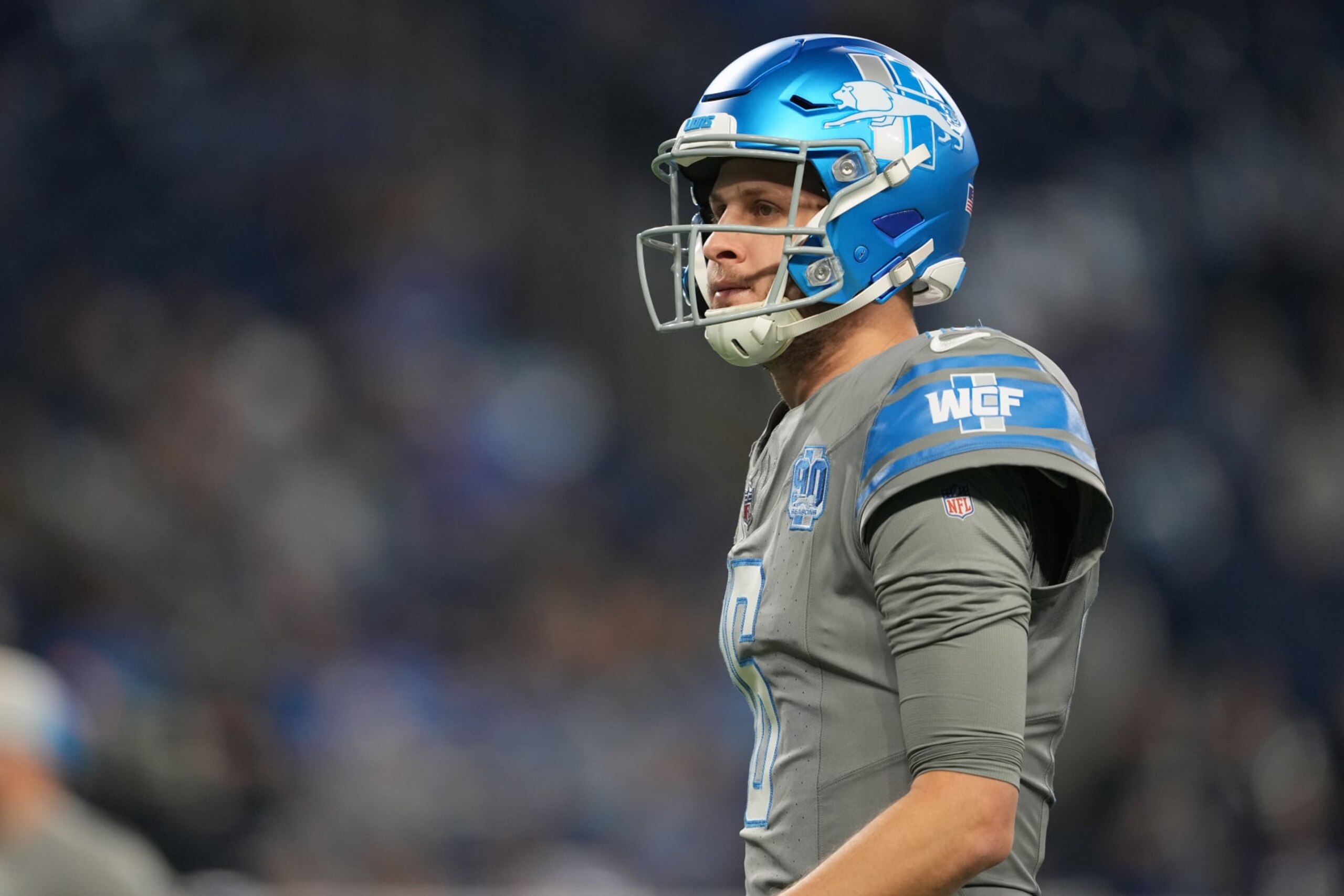 DETROIT, MICHIGAN - JANUARY 07: Jared Goff #16 of the Detroit Lions looks on prior to the game against the Minnesota Vikings at Ford Field on January 07, 2024 in Detroit, Michigan. (Photo by Nic Antaya/Getty Images)