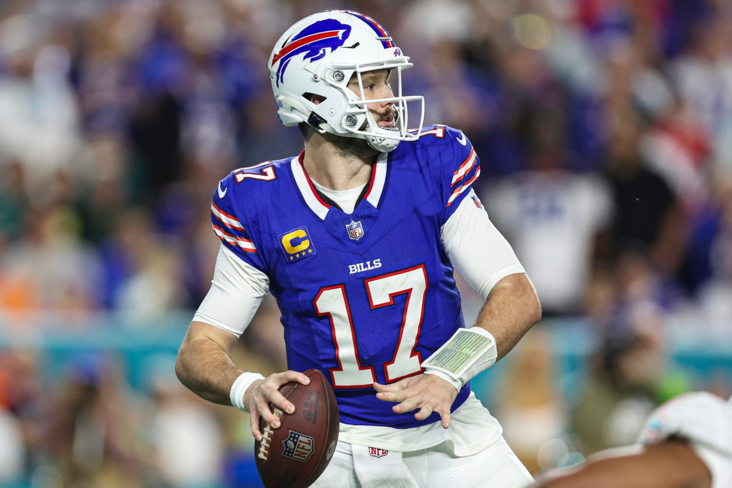 MIAMI GARDENS, FL - JANUARY 07: Josh Allen #17 of the Buffalo Bills drops back to pass during an NFL football game against the Miami Dolphins at Hard Rock Stadium on January 7, 2024 in Miami Gardens, Florida. (Photo by Perry Knotts/Getty Images)