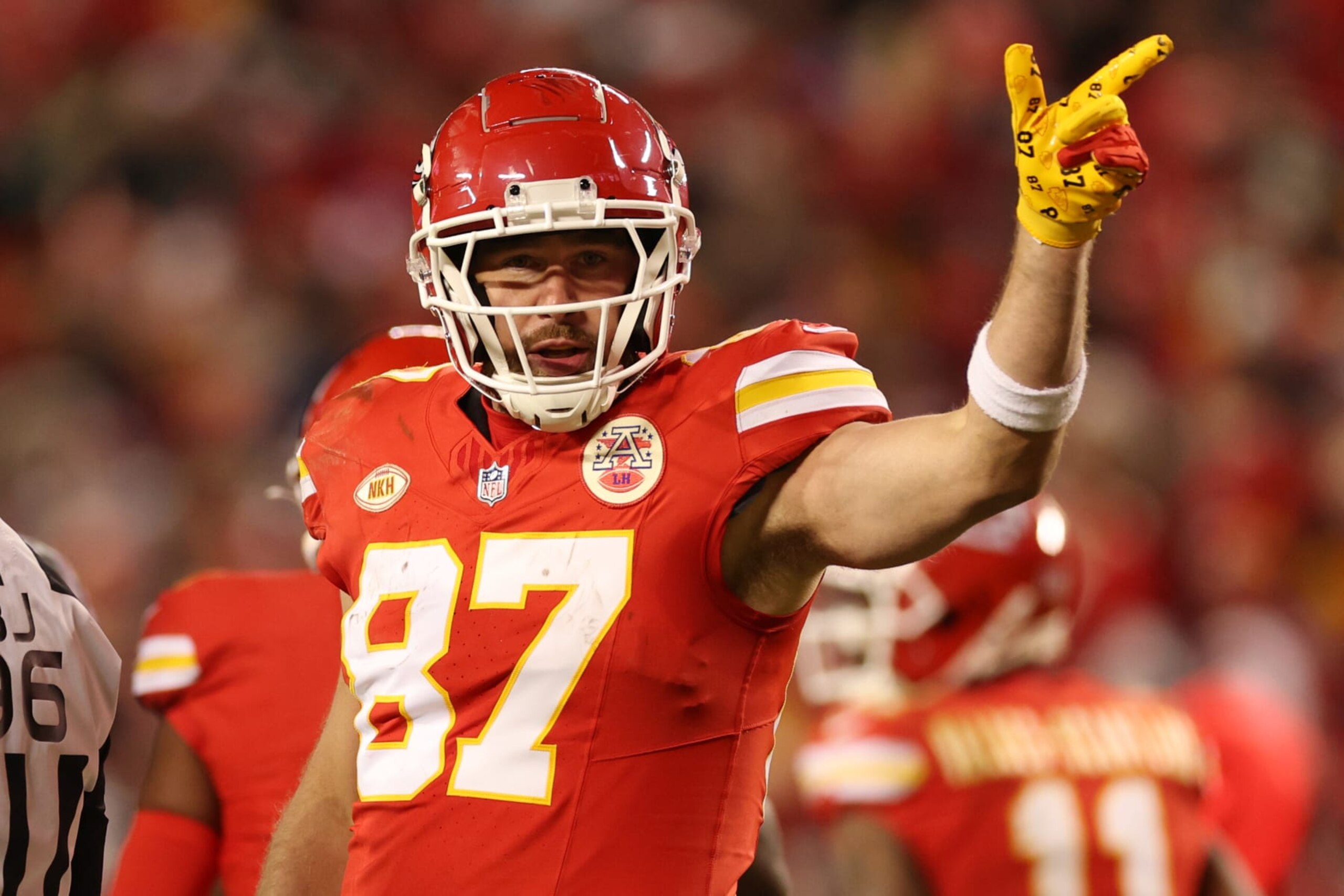 KANSAS CITY, MISSOURI - DECEMBER 31: Travis Kelce #87 of the Kansas City Chiefs reacts after a first down during the third quarter against the Cincinnati Bengals at GEHA Field at Arrowhead Stadium on December 31, 2023 in Kansas City, Missouri. (Photo by Jamie Squire/Getty Images)