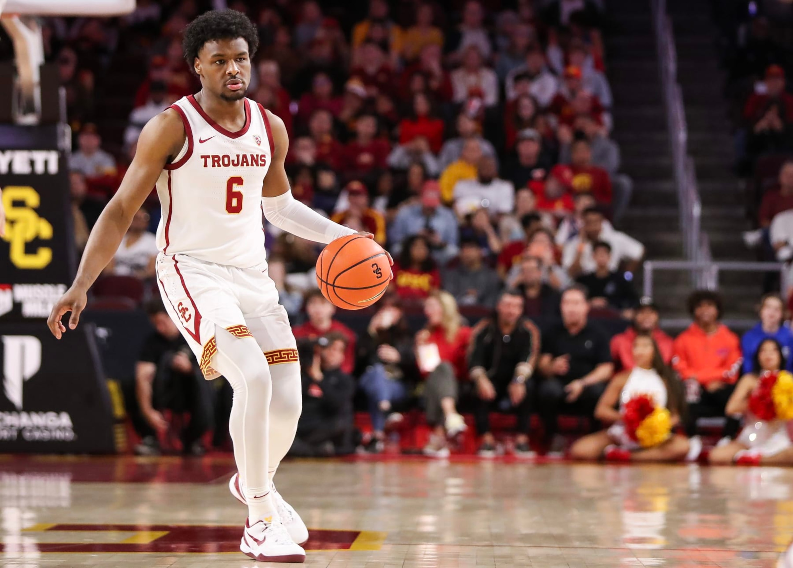 LOS ANGELES, CALIFORNIA - JANUARY 06: Bronny James #6 of the USC Trojans handles the ball in the first half against the Stanford Cardinal at Galen Center on January 06, 2024 in Los Angeles, California. (Photo by Meg Oliphant/Getty Images)