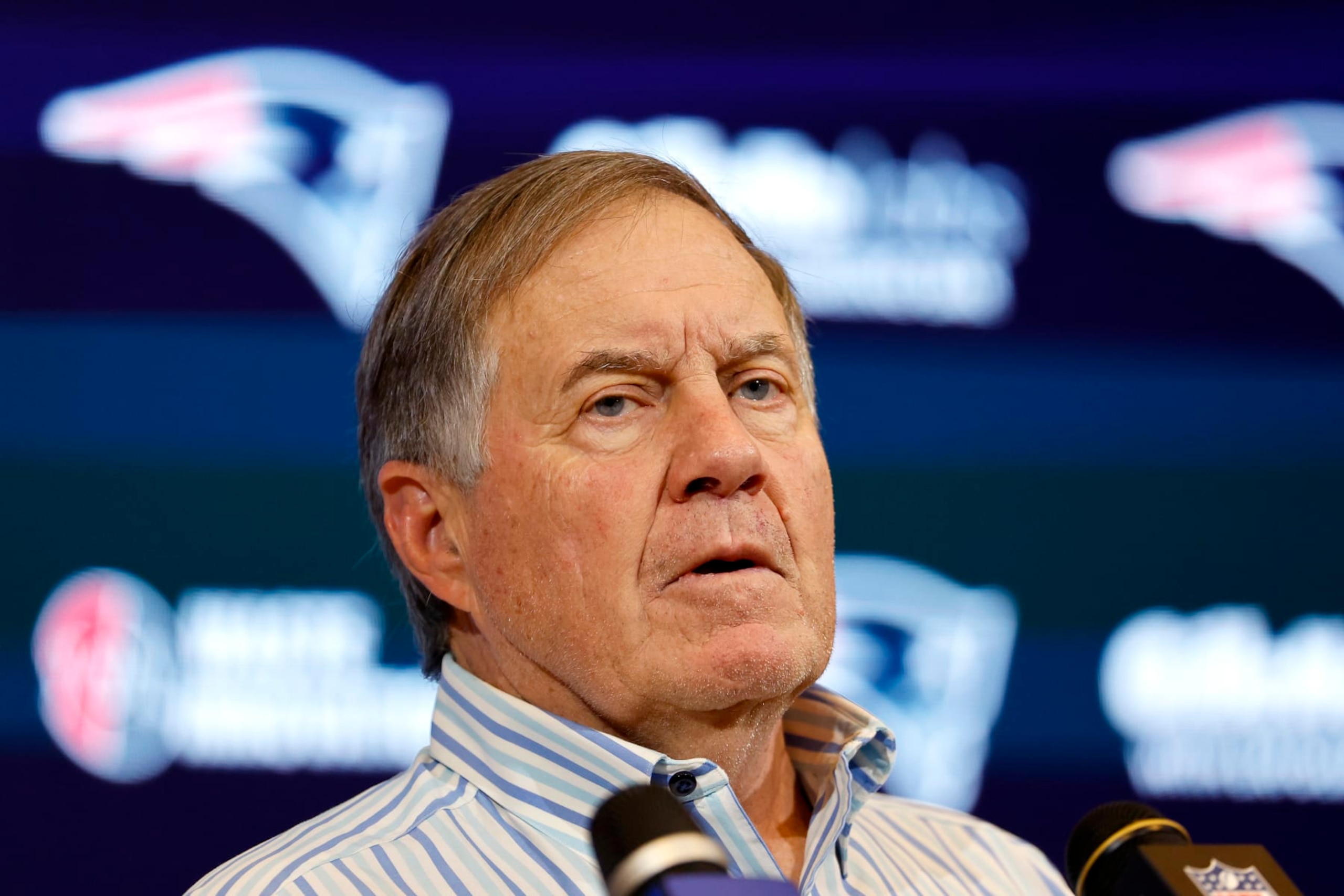 FOXBOROUGH, MASSACHUSETTS - JANUARY 07: New England Patriots head coach Bill Belichick speaks during a press conference after a game against the New York Jets at Gillette Stadium on January 07, 2024 in Foxborough, Massachusetts. (Photo by Winslow Townson/Getty Images) FOXBOROUGH, MASSACHUSETTS - JANUARY 07: New England Patriots head coach Bill Belichick speaks during a press conference after a game against the New York Jets at Gillette Stadium on January 07, 2024 in Foxborough, Massachusetts. (Photo by Winslow Townson/Getty Images)