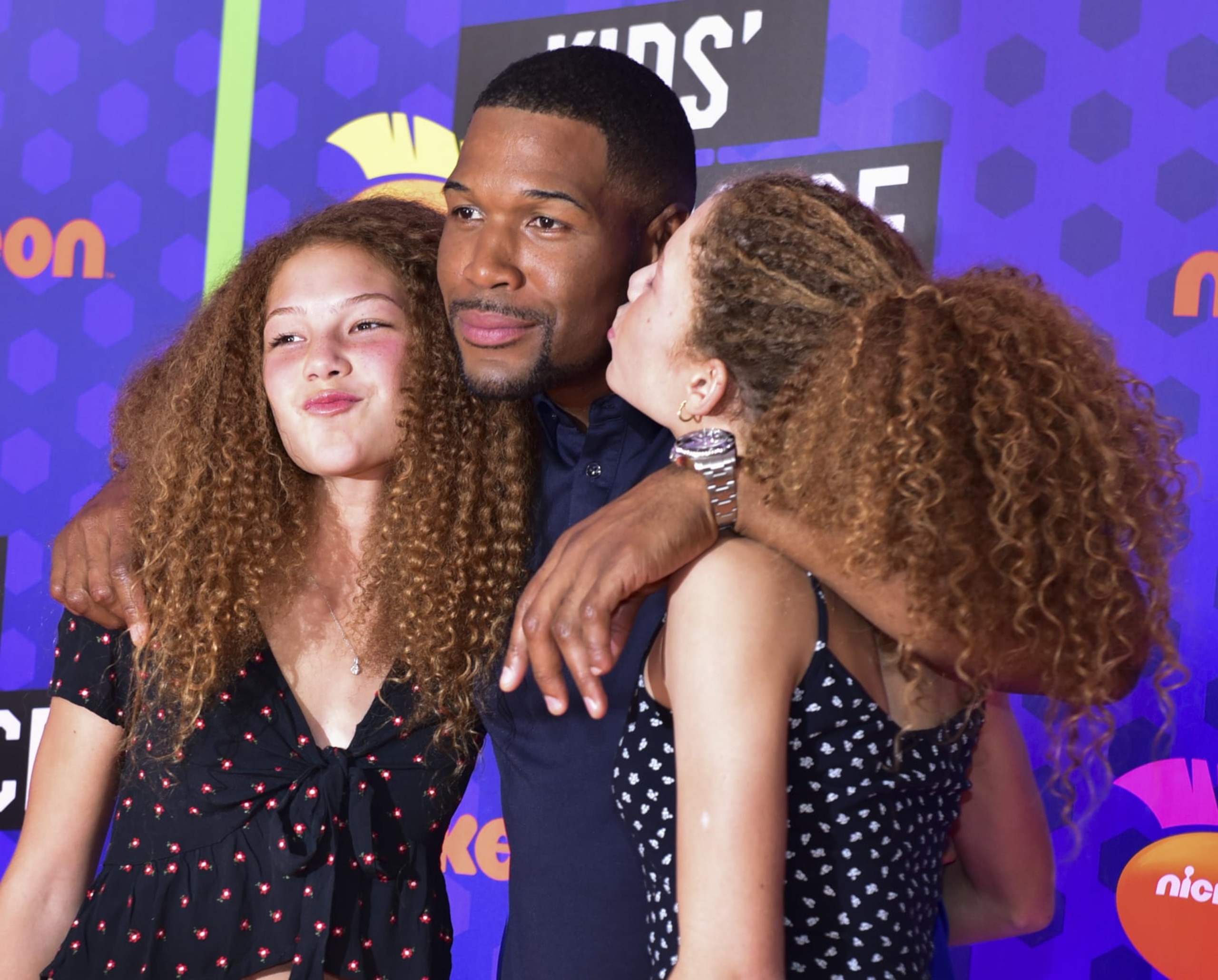 SANTA MONICA, CA - JULY 19:  Former NFL player Michael Strahan (C) and daughters, Isabella Strahan and Sophia Strahan attend Nickelodeon Kids' Choice Sports Awards 2018 at Barker Hangar on July 19, 2018 in Santa Monica, California.  (Photo by Rodin Eckenroth/FilmMagic)