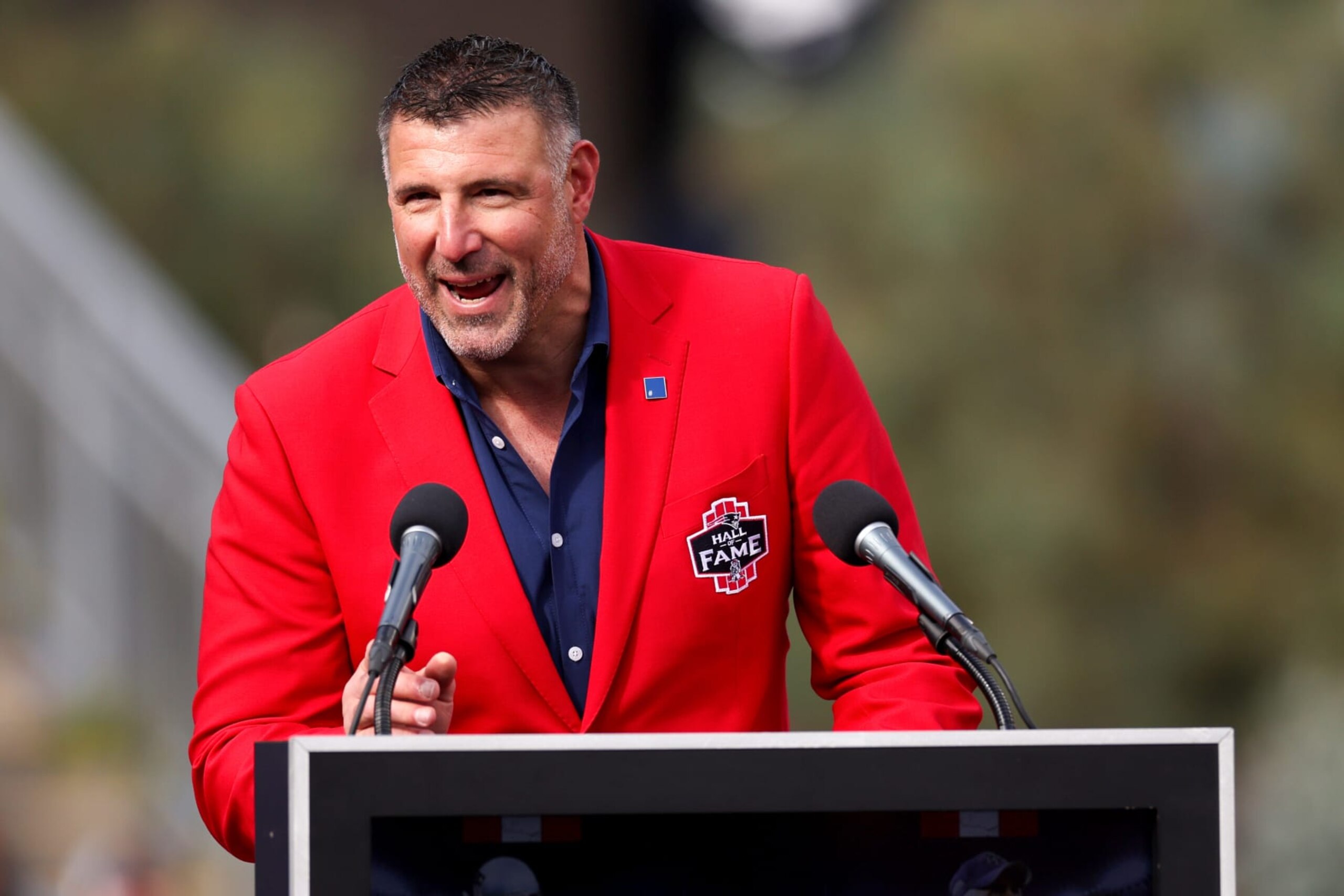 FOXBOROUGH, MASSACHUSETTS - OCTOBER 22: Former player Mike Vrabel speaks during a New England Patriots Hall of Fame induction ceremony during halftime of the game against the Buffalo Bills at Gillette Stadium on October 22, 2023 in Foxborough, Massachusetts. (Photo by Maddie Meyer/Getty Images) FOXBOROUGH, MASSACHUSETTS - OCTOBER 22: Former player Mike Vrabel speaks during a New England Patriots Hall of Fame induction ceremony during halftime of the game against the Buffalo Bills at Gillette Stadium on October 22, 2023 in Foxborough, Massachusetts. (Photo by Maddie Meyer/Getty Images)