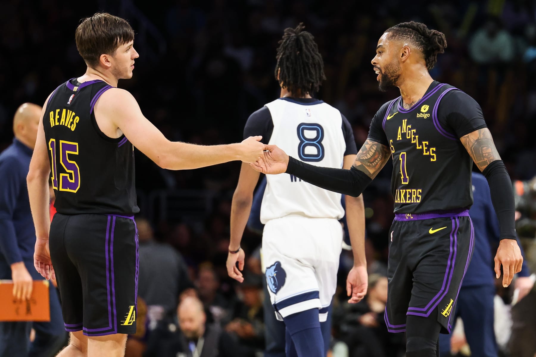 Los Angeles, CA - November 14: Los Angeles Lakers' Austin Reaves and D'Angelo Russel celebrate during the third quarter of gameplay against the Memphis Grizzlies at theCrypto.com Arena on Tuesday, Nov. 14, 2023, in Los Angeles, CA. (Wally Skalij / Los Angeles Times via Getty Images)