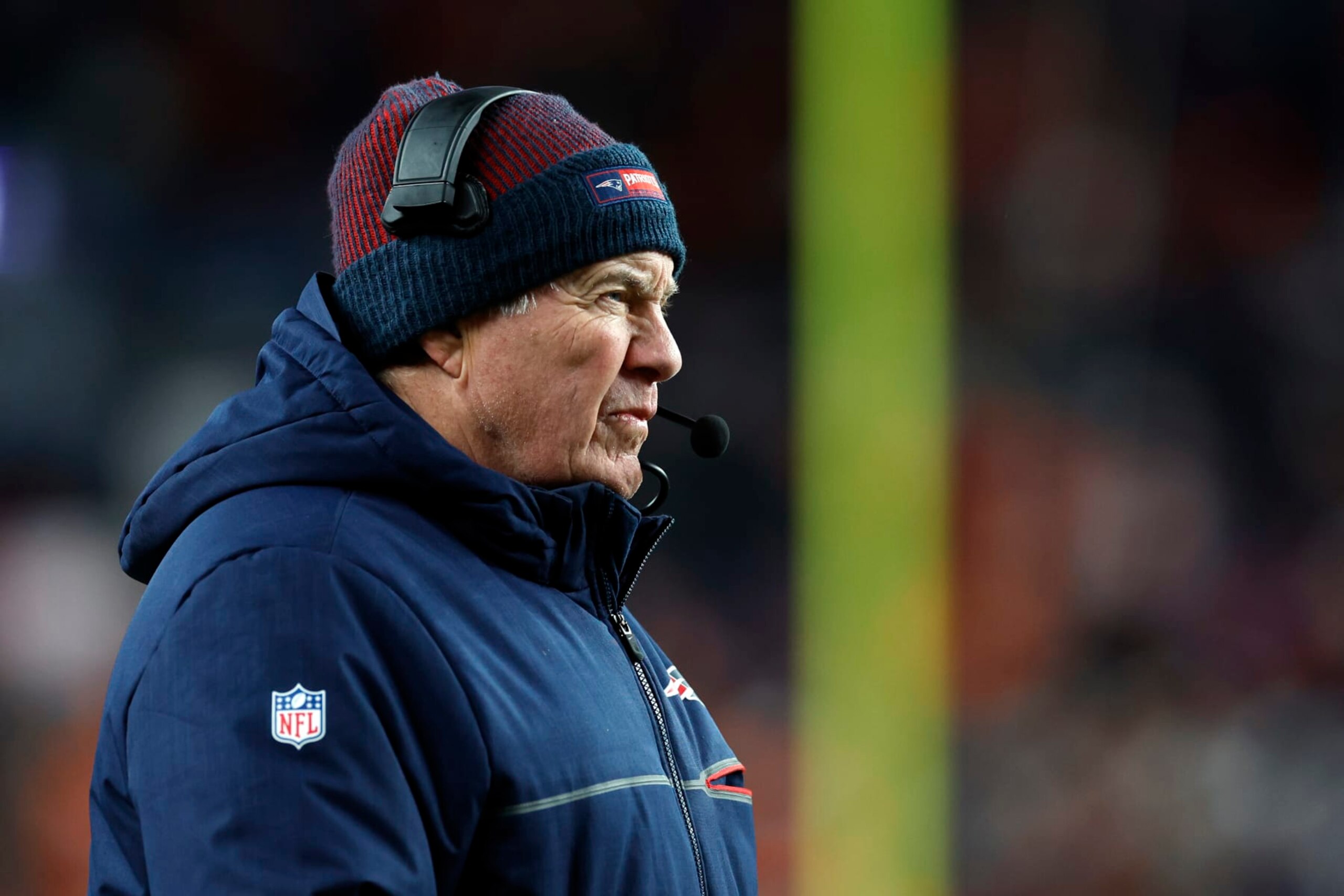 Denver, CO - December 24: New England Patriots head coach Bill Belichick watches the action in the first half. The Patriots beat the Denver Broncos, 26-23. (Photo by Danielle Parhizkaran/The Boston Globe via Getty Images)