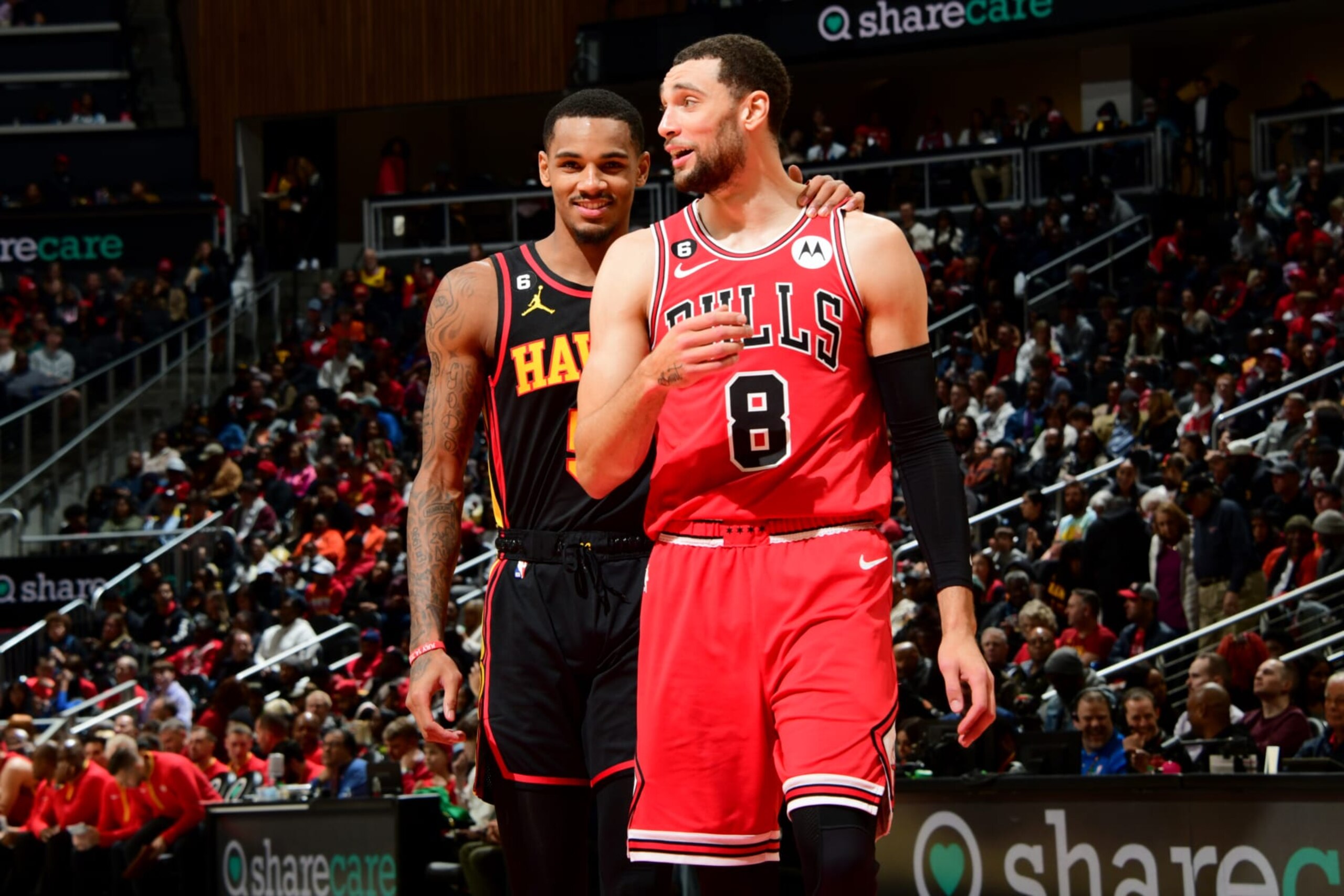 ATLANTA, GA - DECEMBER 21: Dejounte Murray #5 of the Atlanta Hawks talks with Zach LaVine #8 of the Chicago Bulls during the game on December 21, 2022 at State Farm Arena in Atlanta, Georgia.  NOTE TO USER: User expressly acknowledges and agrees that, by downloading and/or using this Photograph, user is consenting to the terms and conditions of the Getty Images License Agreement. Mandatory Copyright Notice: Copyright 2022 NBAE (Photo by Scott Cunningham/NBAE via Getty Images)