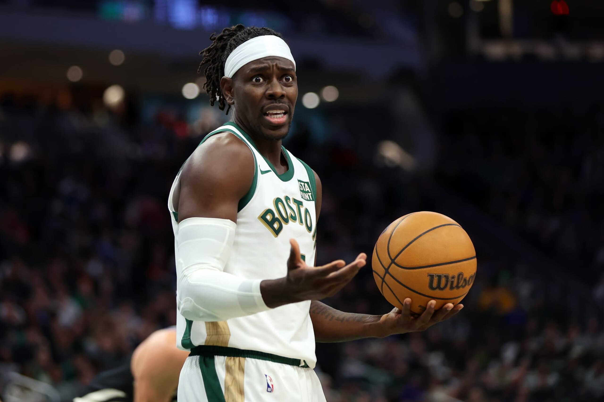 MILWAUKEE, WISCONSIN - JANUARY 11:  Jrue Holiday #4 of the Boston Celtics reacts to an officials call during the first half of a game against the Milwaukee Bucks at Fiserv Forum on January 11, 2024 in Milwaukee, Wisconsin. NOTE TO USER: User expressly acknowledges and agrees that, by downloading and or using this photograph, User is consenting to the terms and conditions of the Getty Images License Agreement. (Photo by Stacy Revere/Getty Images)