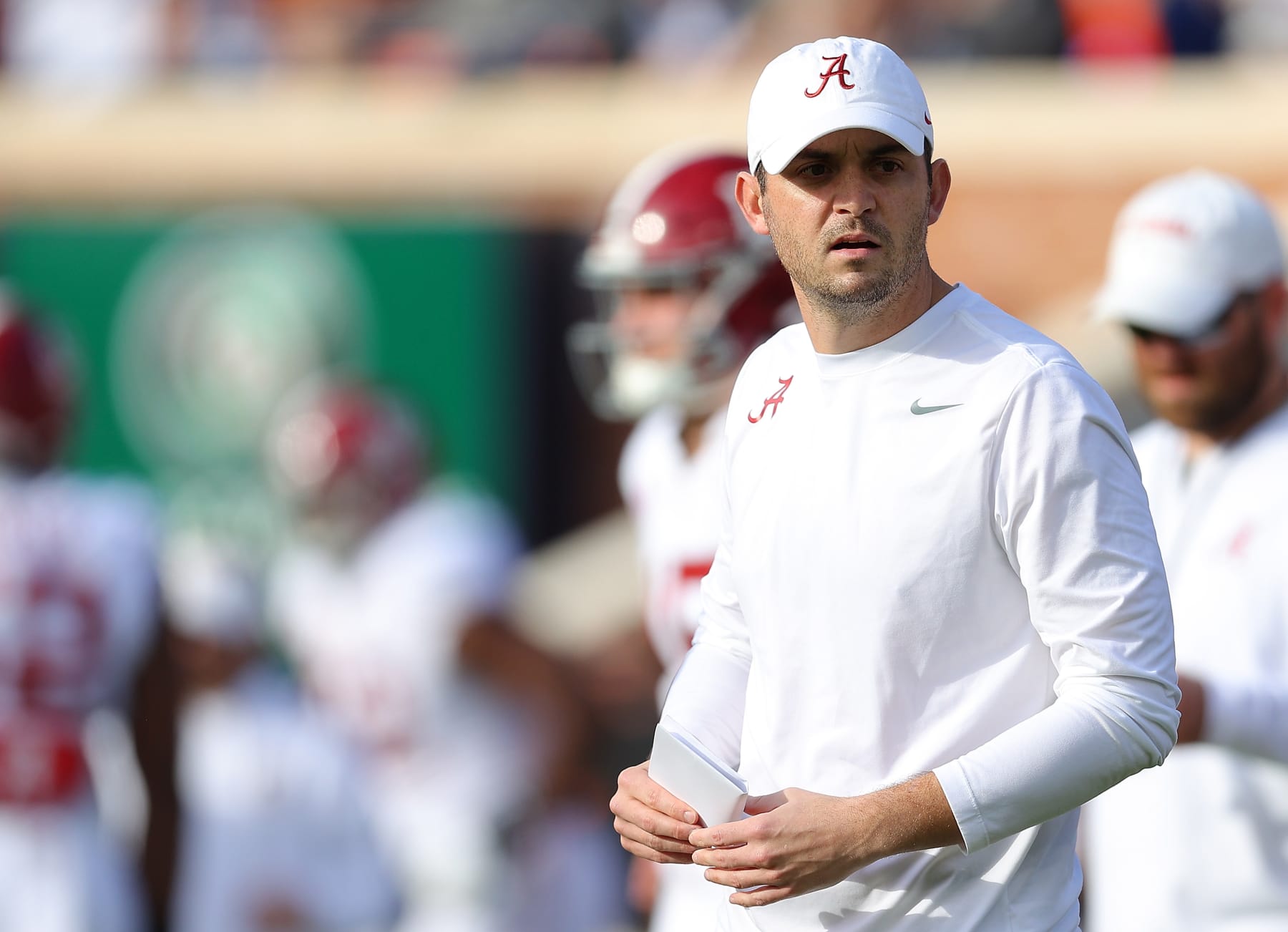 AUBURN, ALABAMA - NOVEMBER 25:  Offensive coordinator Tommy Rees of the Alabama Crimson Tide warms up the quarterbacks prior to the game against Auburn Tigers at Jordan-Hare Stadium on November 25, 2023 in Auburn, Alabama. (Photo by Kevin C. Cox/Getty Images)