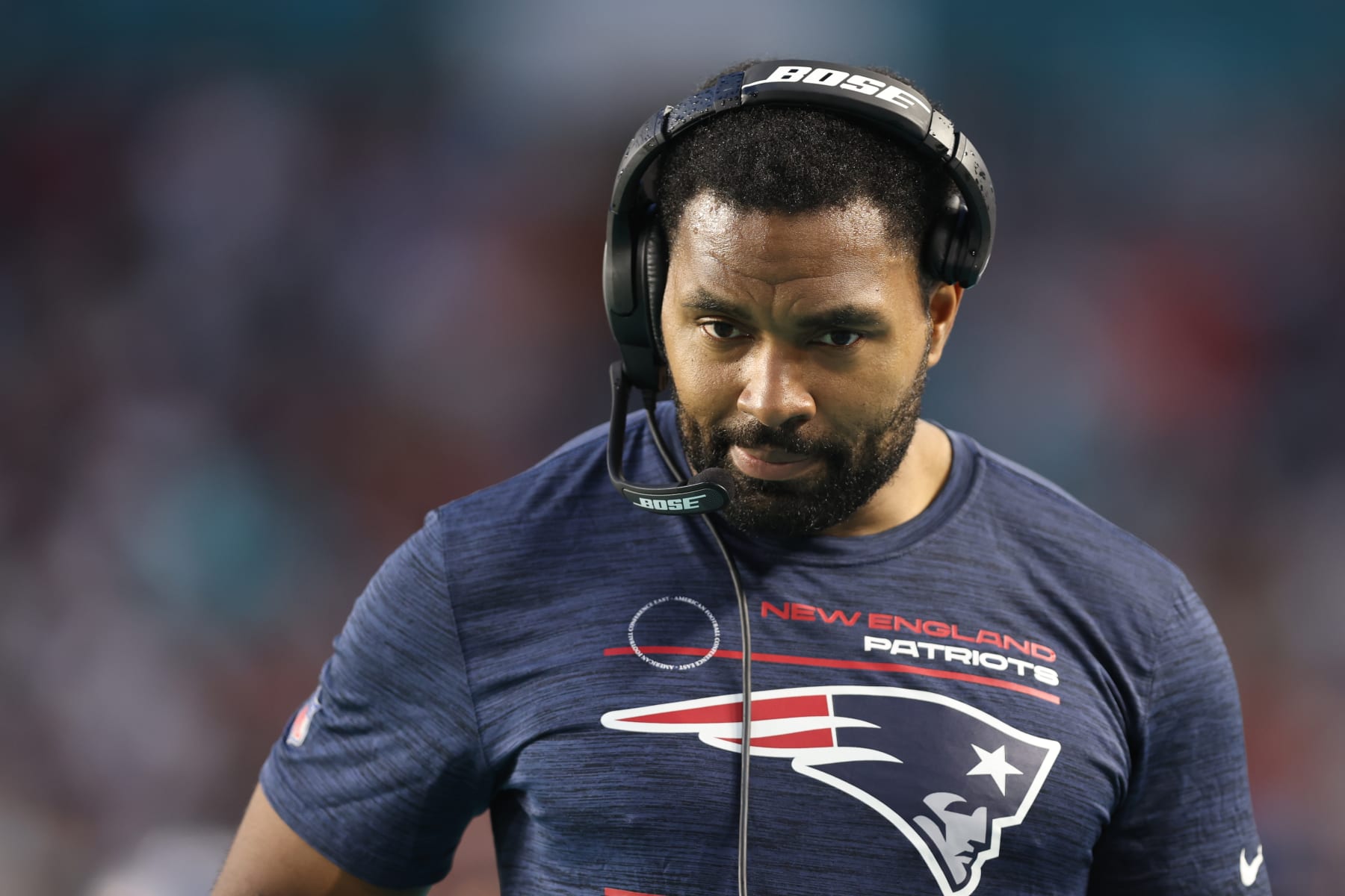 MIAMI GARDENS, FL - JANUARY 9: New England Patriots insider linebackers coach Jerod Mayo stands on the sideline against the Miami Dolphins prior to the game  at Hard Rock Stadium on January 9, 2022 in Miami Gardens, Florida. (Photo by Perry Knotts/Getty Images)
