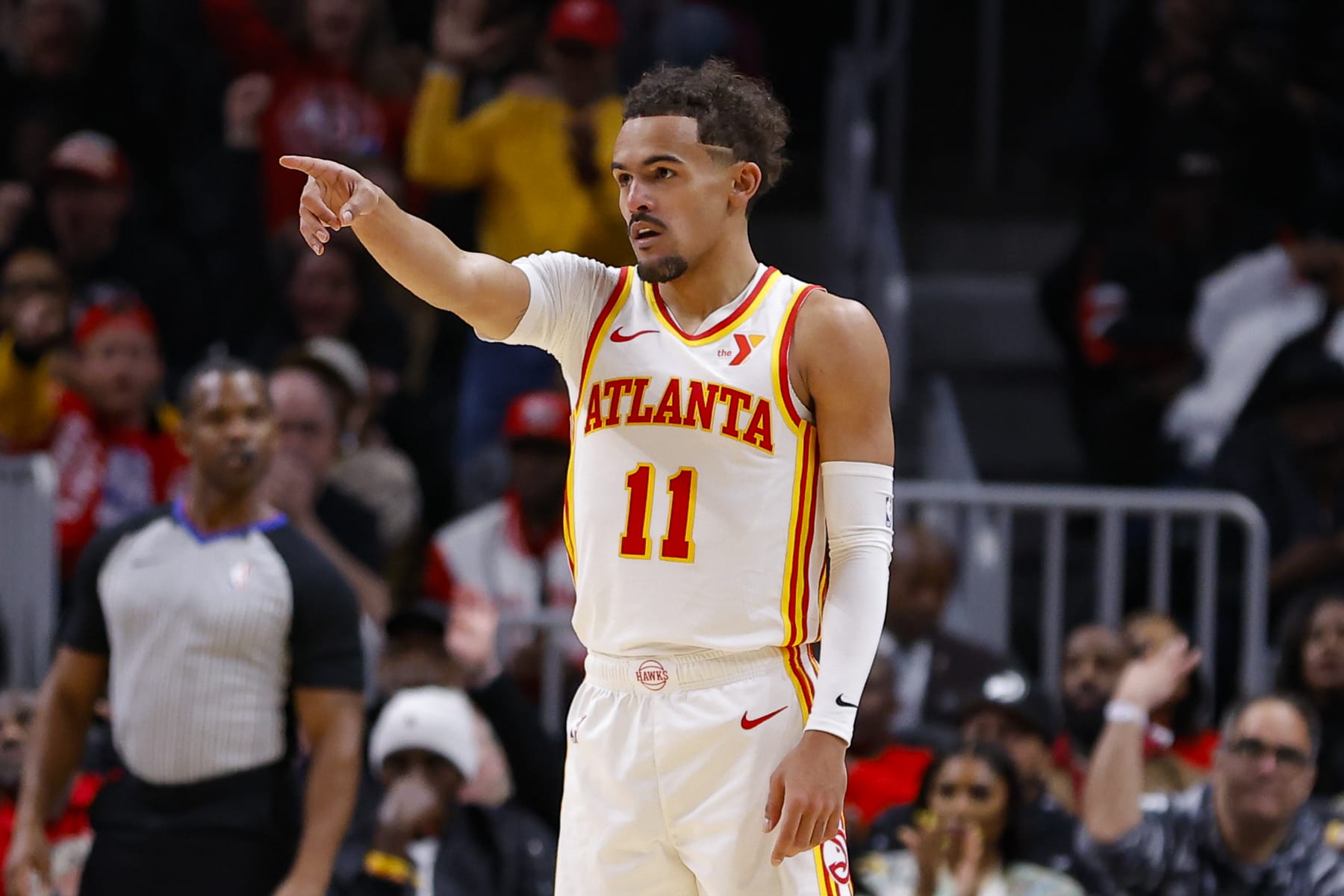 ATLANTA, GEORGIA - JANUARY 10: Trae Young #11 of the Atlanta Hawks gestures during the second quarter against the Philadelphia 76ers at State Farm Arena on January 10, 2024 in Atlanta, Georgia. NOTE TO USER: User expressly acknowledges and agrees that, by downloading and or using this photograph, User is consenting to the terms and conditions of the Getty Images License Agreement. (Photo by Todd Kirkland/Getty Images)