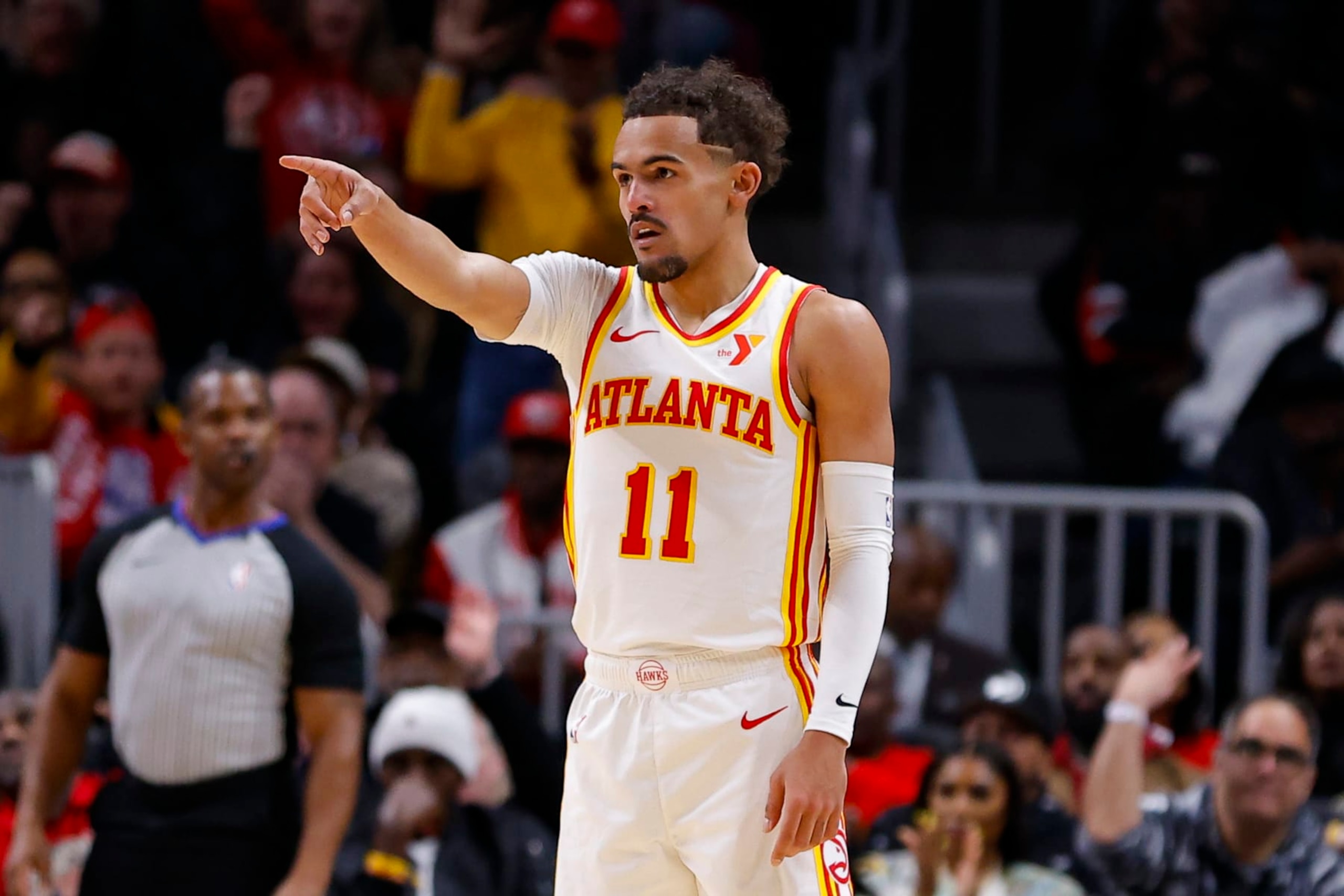 ATLANTA, GEORGIA - JANUARY 10: Trae Young #11 of the Atlanta Hawks gestures during the second quarter against the Philadelphia 76ers at State Farm Arena on January 10, 2024 in Atlanta, Georgia. NOTE TO USER: User expressly acknowledges and agrees that, by downloading and or using this photograph, User is consenting to the terms and conditions of the Getty Images License Agreement. (Photo by Todd Kirkland/Getty Images)