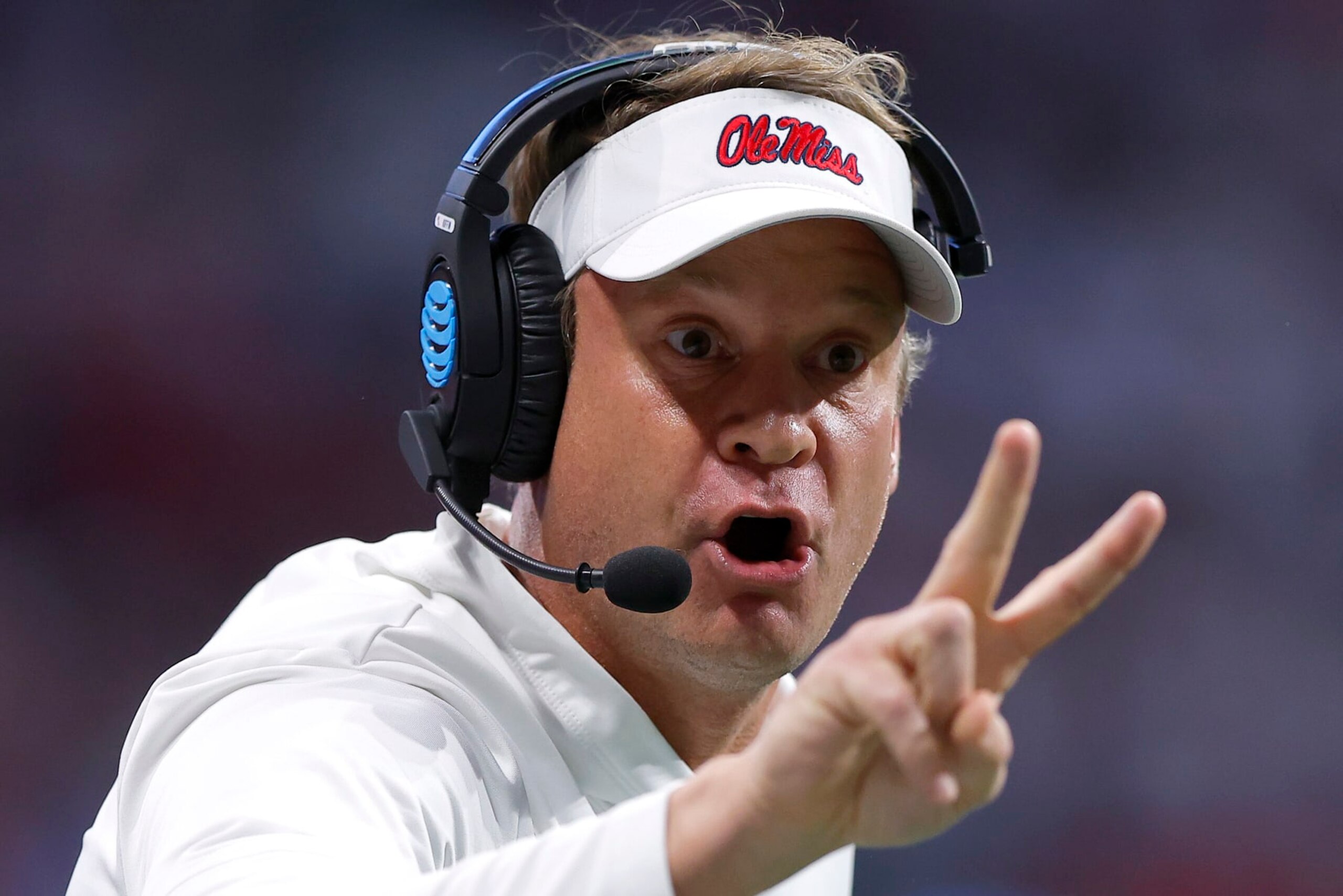 ATLANTA, GEORGIA - DECEMBER 30: Head coach Lane Kiffin of the Mississippi Rebels gestures for a two-point conversion against the Penn State Nittany Lions during the third quarter in the Chick-fil-A Peach Bowl at Mercedes-Benz Stadium on December 30, 2023 in Atlanta, Georgia. (Photo by Todd Kirkland/Getty Images)