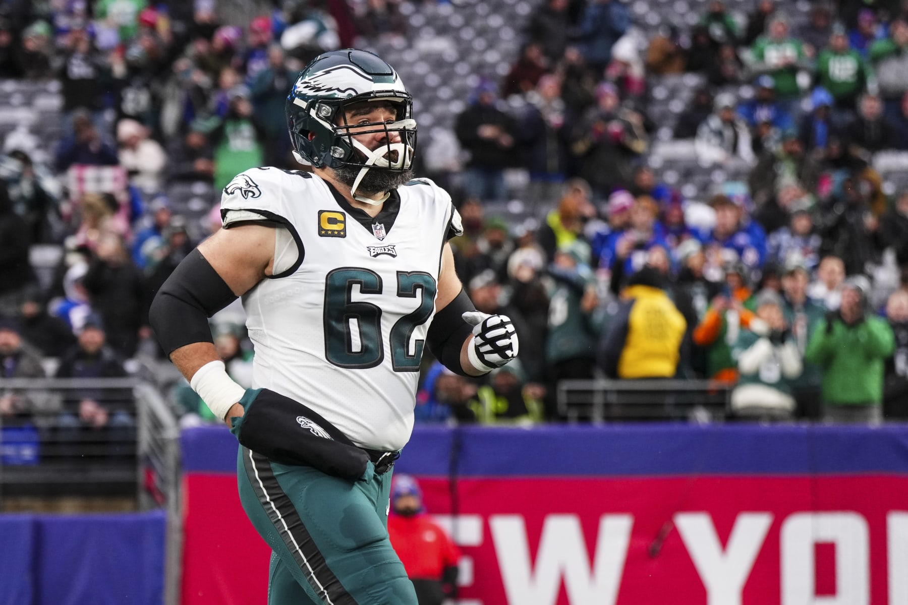 EAST RUTHERFORD, NJ - JANUARY 07: Jason Kelce #62 of the Philadelphia Eagles runs out of the tunnel prior to an NFL football game against the New York Giants at MetLife Stadium on January 7, 2024 in East Rutherford, New Jersey. (Photo by Cooper Neill/Getty Images)