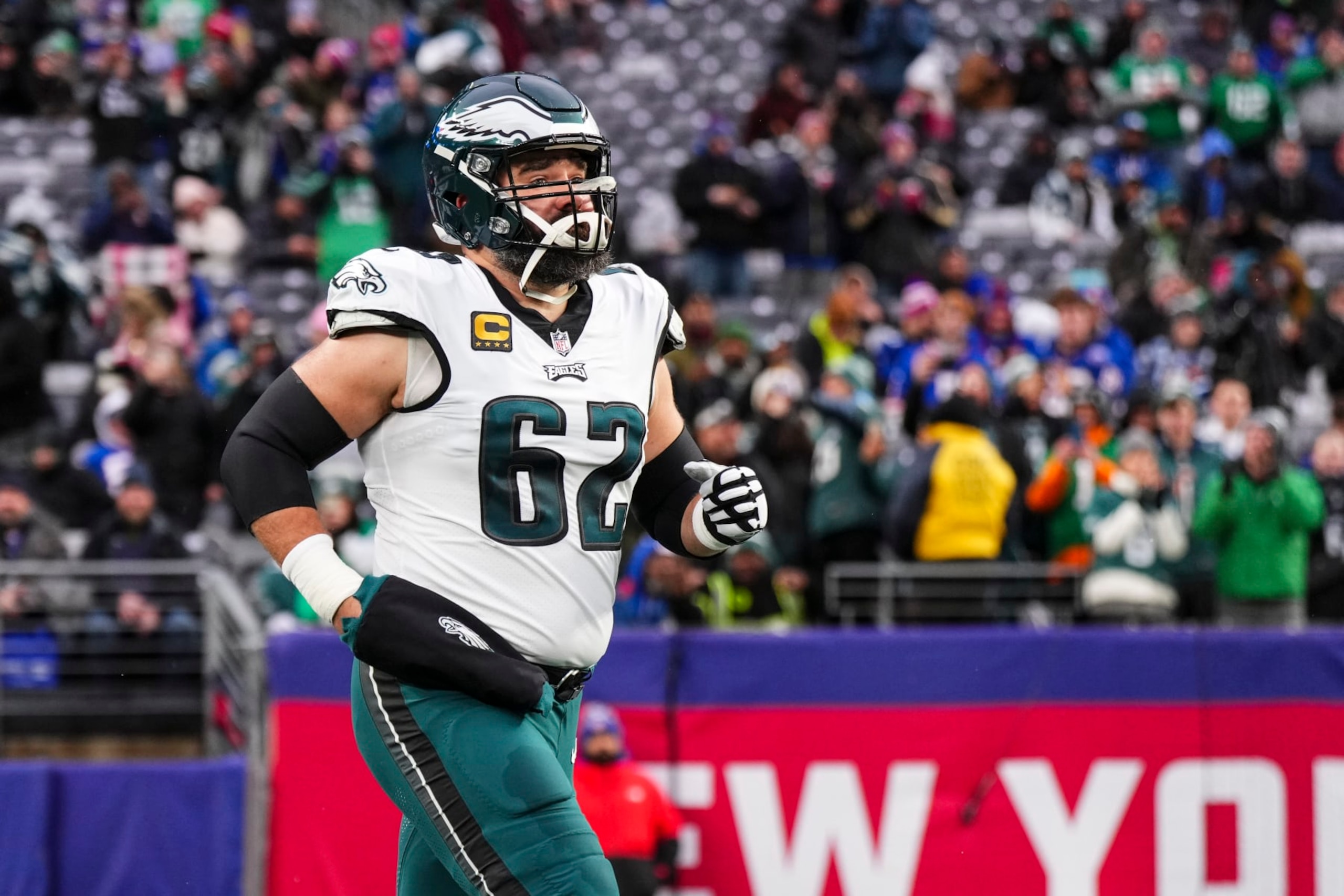 EAST RUTHERFORD, NJ - JANUARY 07: Jason Kelce #62 of the Philadelphia Eagles runs out of the tunnel prior to an NFL football game against the New York Giants at MetLife Stadium on January 7, 2024 in East Rutherford, New Jersey. (Photo by Cooper Neill/Getty Images)