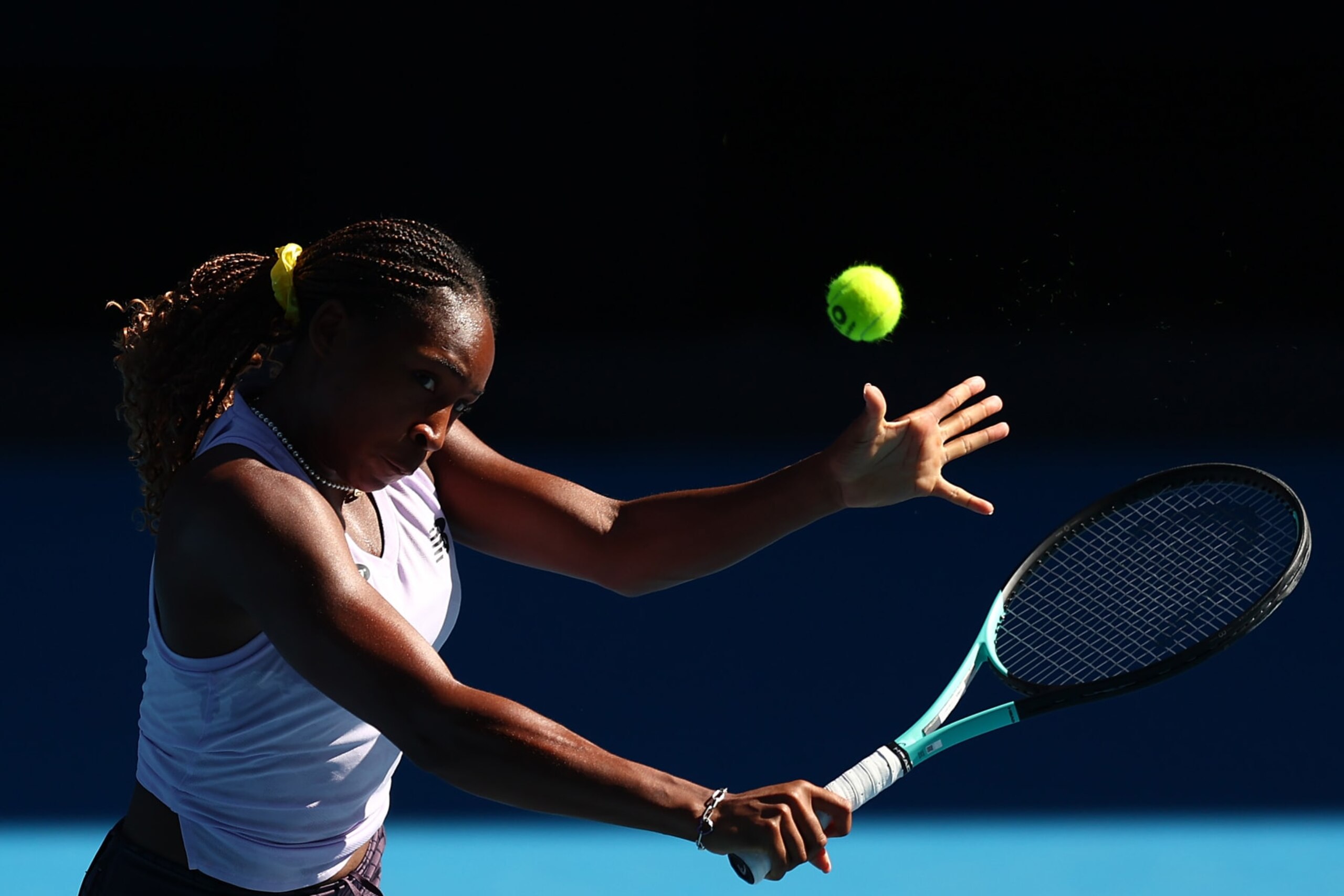 MELBOURNE, AUSTRALIA - JANUARY 11: Coco Gauff of the United States plays a backhand during a training session ahead of the 2024 Australian Open at Melbourne Park on January 11, 2024 in Melbourne, Australia. (Photo by Graham Denholm/Getty Images)