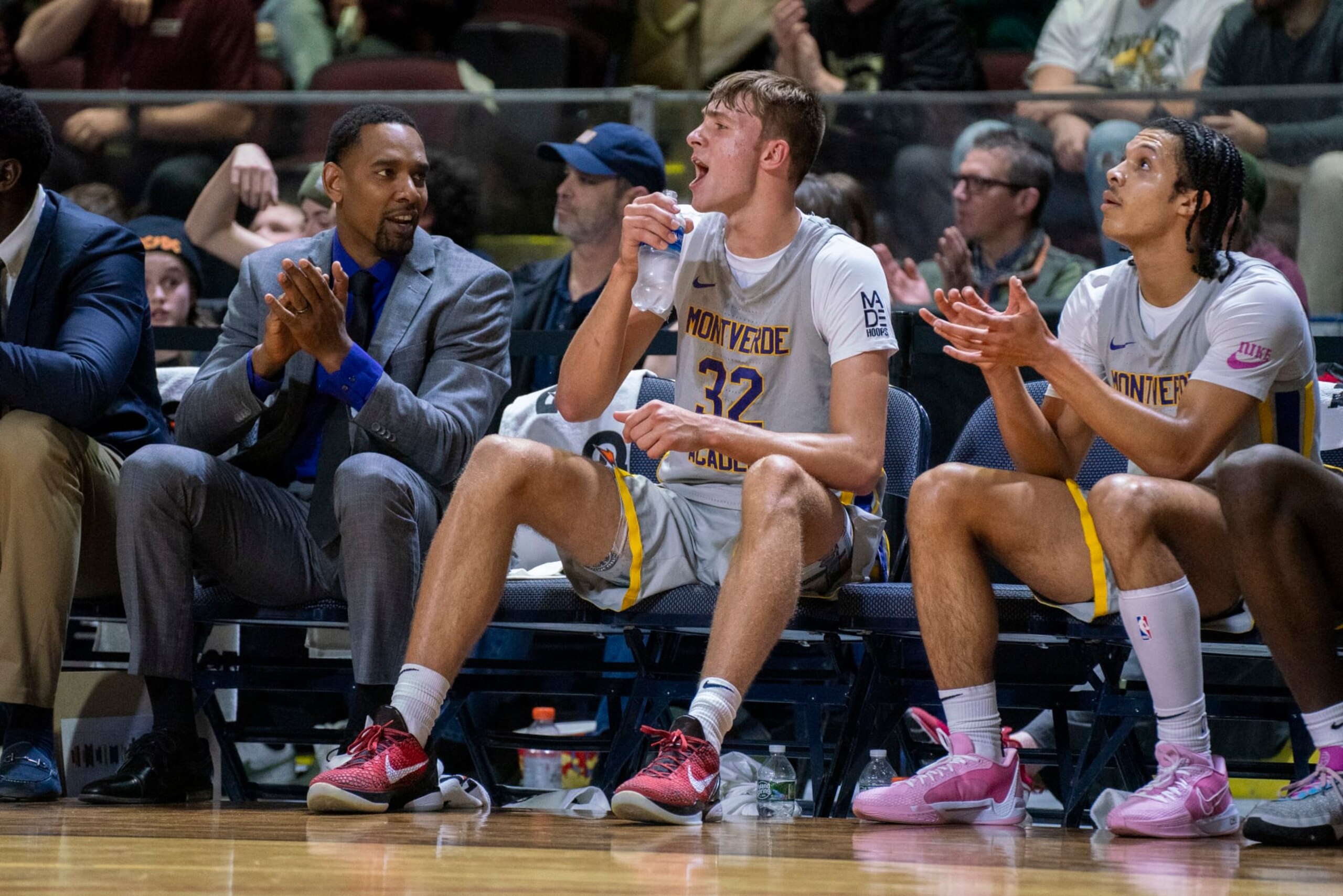 PORTLAND, MAINE - JANUARY 5: Cooper Flagg, center, cheers on his Montverde Academy teammates from the bench during the team's game against Gonzaga College High School at the Cross Insurance Arena in Portland, Maine, on January 5, 2024. Montverde Academy beat Gonzaga College High School 93-51. (Photo by Andrew Dickinson for The Washington Post via Getty Images)