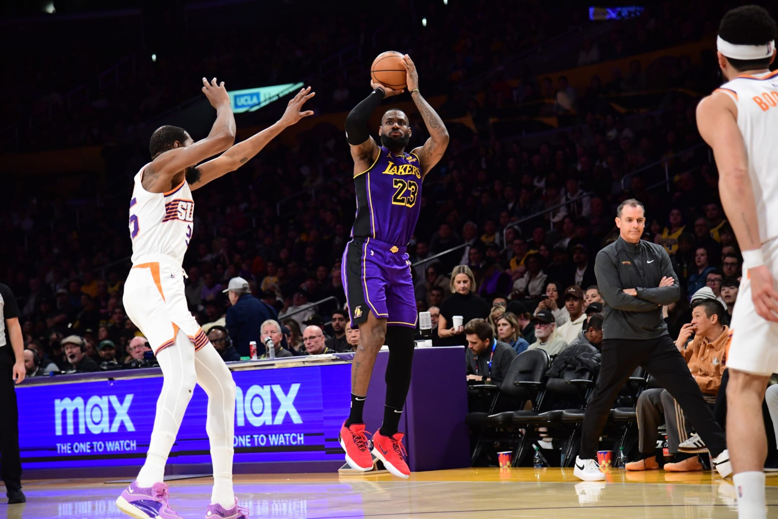 LOS ANGELES, CA - JANUARY 11: LeBron James #23 of the Los Angeles Lakers shoots a three point basket during the game against the Phoenix Suns on January 11, 2024 at Crypto.Com Arena in Los Angeles, California. NOTE TO USER: User expressly acknowledges and agrees that, by downloading and/or using this Photograph, user is consenting to the terms and conditions of the Getty Images License Agreement. Mandatory Copyright Notice: Copyright 2024 NBAE (Photo by Adam Pantozzi/NBAE via Getty Images)