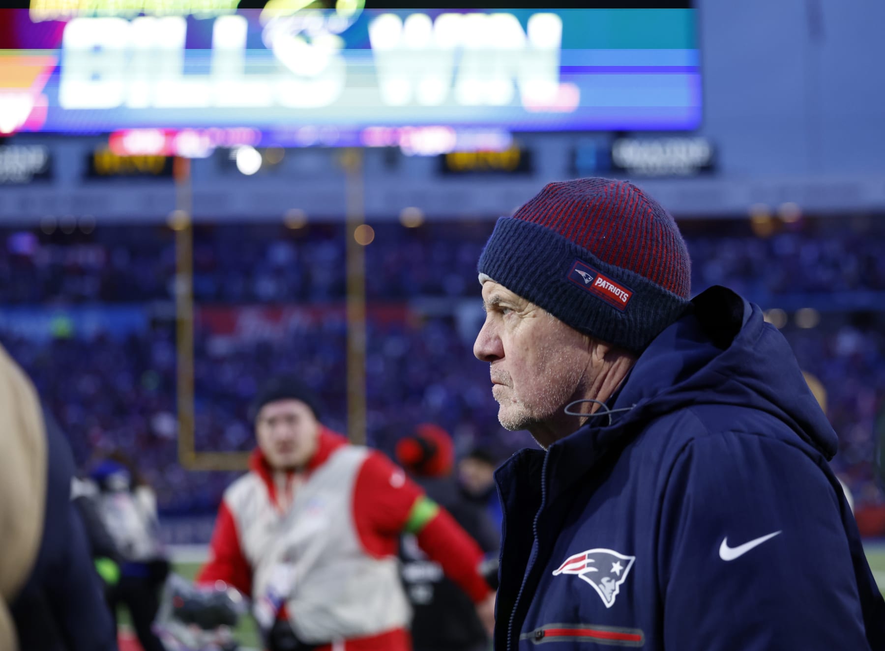 Orchard Park, NY - December 31: New England Patriots head coach Bill Belichick goes out onto the field for the postgame handshake. The Patriots lost to the Buffalo Bills, 27-21. (Photo by Danielle Parhizkaran/The Boston Globe via Getty Images)