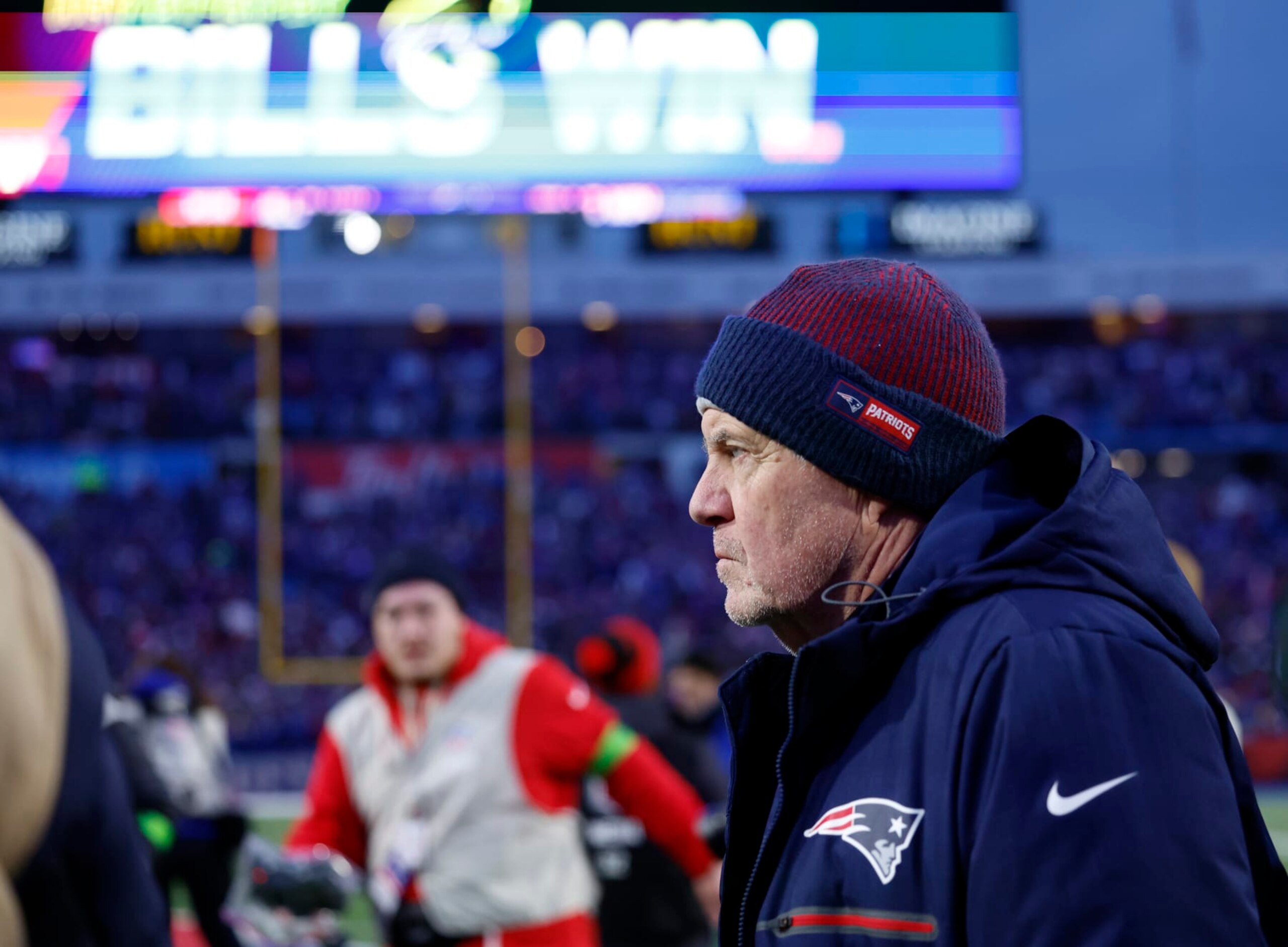 Orchard Park, NY - December 31: New England Patriots head coach Bill Belichick goes out onto the field for the postgame handshake. The Patriots lost to the Buffalo Bills, 27-21. (Photo by Danielle Parhizkaran/The Boston Globe via Getty Images) Orchard Park, NY - December 31: New England Patriots head coach Bill Belichick goes out onto the field for the postgame handshake. The Patriots lost to the Buffalo Bills, 27-21. (Photo by Danielle Parhizkaran/The Boston Globe via Getty Images)