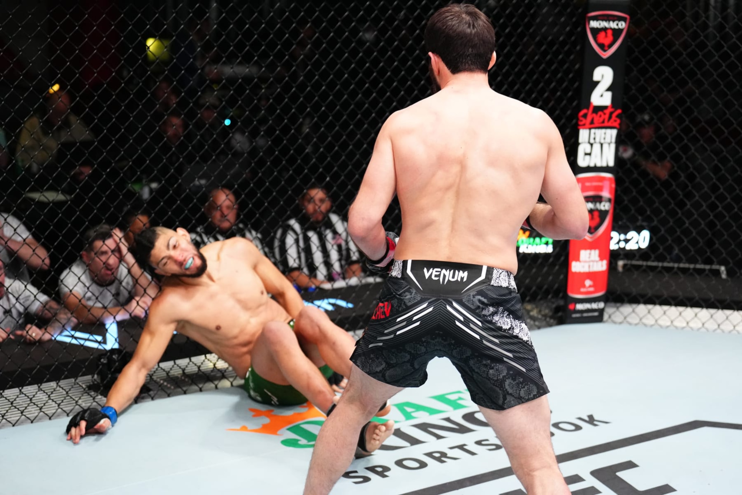 LAS VEGAS, NEVADA - JANUARY 13: (R-L) Magomed Ankalaev of Russia knocks out Johnny Walker of Brazil in a light heavyweight fight during the UFC Fight Night event at UFC APEX on January 13, 2024 in Las Vegas, Nevada. (Photo by Chris Unger/Zuffa LLC via Getty Images)