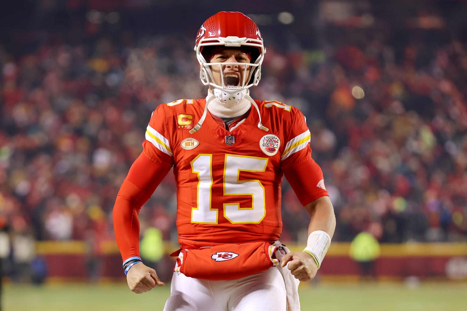 KANSAS CITY, MISSOURI - JANUARY 13: Patrick Mahomes #15 of the Kansas City Chiefs reacts as he takes the field before the AFC Wild Card Playoffs against the Miami Dolphins at GEHA Field at Arrowhead Stadium on January 13, 2024 in Kansas City, Missouri. (Photo by Jamie Squire/Getty Images)