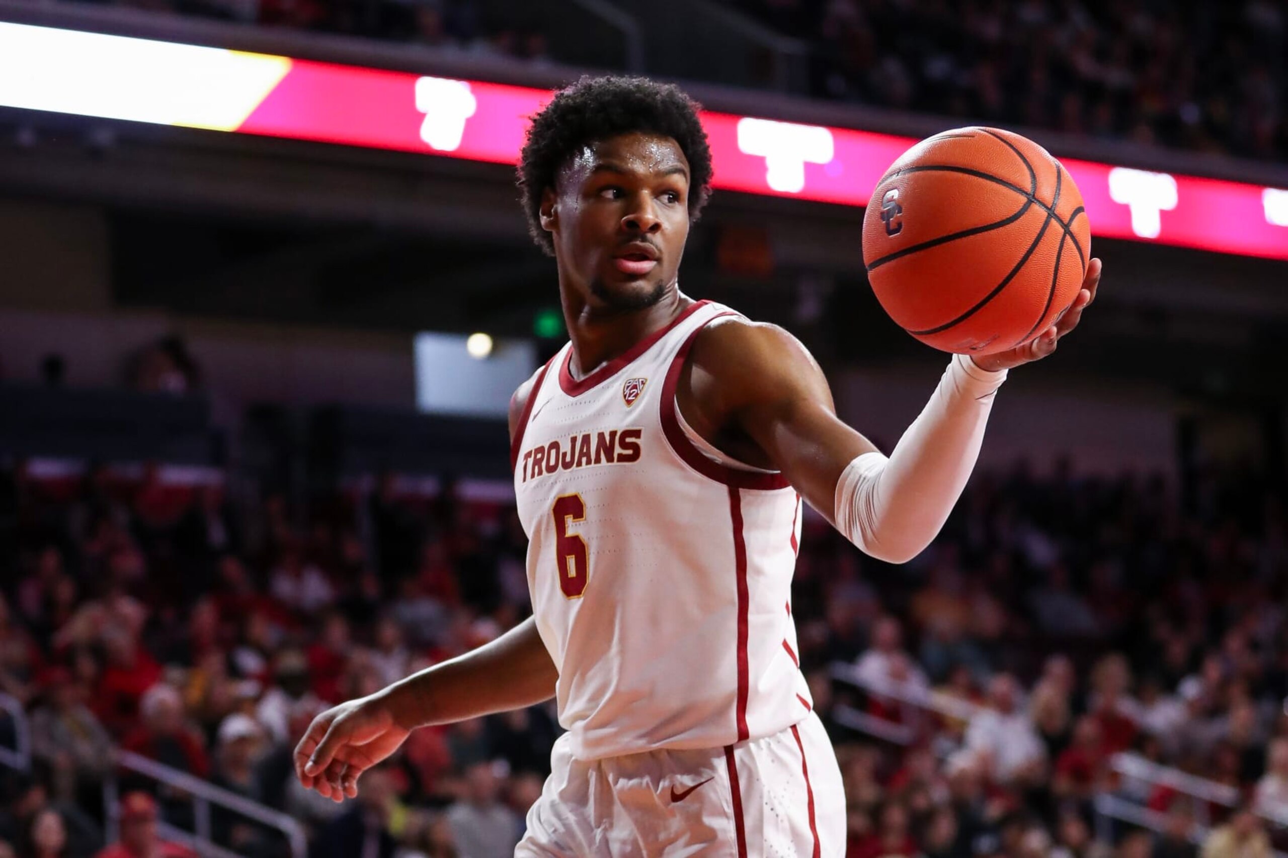 LOS ANGELES, CALIFORNIA - JANUARY 06: Bronny James #6 of the USC Trojans looks to pass the ball in the second half against the Stanford Cardinal at Galen Center on January 06, 2024 in Los Angeles, California. (Photo by Meg Oliphant/Getty Images)