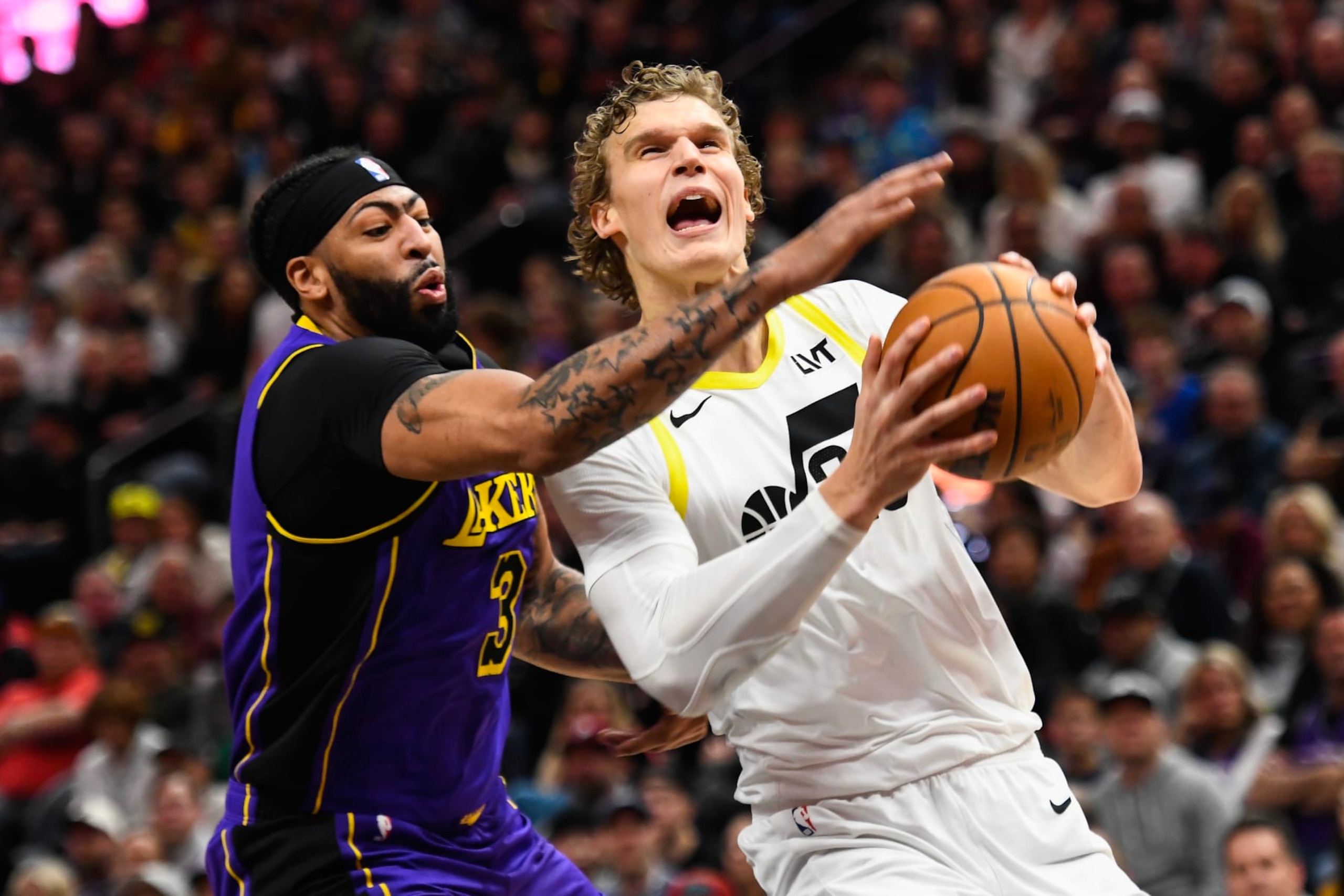 SALT LAKE CITY, UTAH - JANUARY 13: Anthony Davis #3 of the Los Angeles Lakers defends Lauri Markkanen #23 of the Utah Jazz during the first half of a game at Delta Center on January 13, 2024 in Salt Lake City, Utah. NOTE TO USER: User expressly acknowledges and agrees that, by downloading and or using this photograph, User is consenting to the terms and conditions of the Getty Images License Agreement. (Photo by Alex Goodlett/Getty Images) SALT LAKE CITY, UTAH - JANUARY 13: Anthony Davis #3 of the Los Angeles Lakers defends Lauri Markkanen #23 of the Utah Jazz during the first half of a game at Delta Center on January 13, 2024 in Salt Lake City, Utah. NOTE TO USER: User expressly acknowledges and agrees that, by downloading and or using this photograph, User is consenting to the terms and conditions of the Getty Images License Agreement. (Photo by Alex Goodlett/Getty Images)
