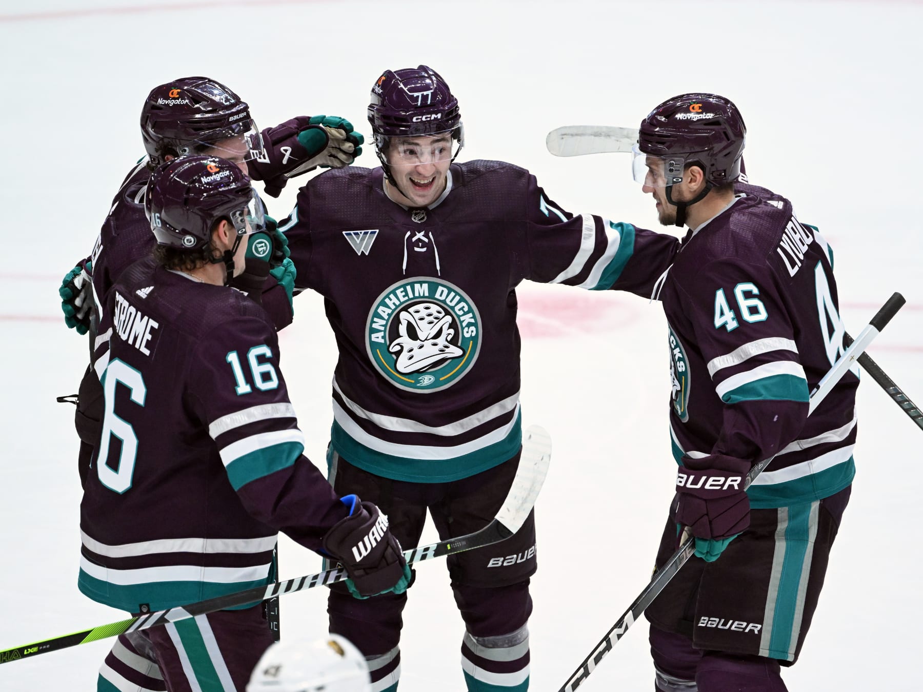 ANAHEIM, CA - DECEMBER 27: Anaheim Ducks left wing Frank Vatrano (77) celebrates on the ice with his teammates after Vatrano scored a goal during the first period of an NHL hockey game against the Vegas Golden Knights played on December 27, 2023 at the Honda Center in Anaheim, CA. (Photo by John Cordes/Icon Sportswire via Getty Images)