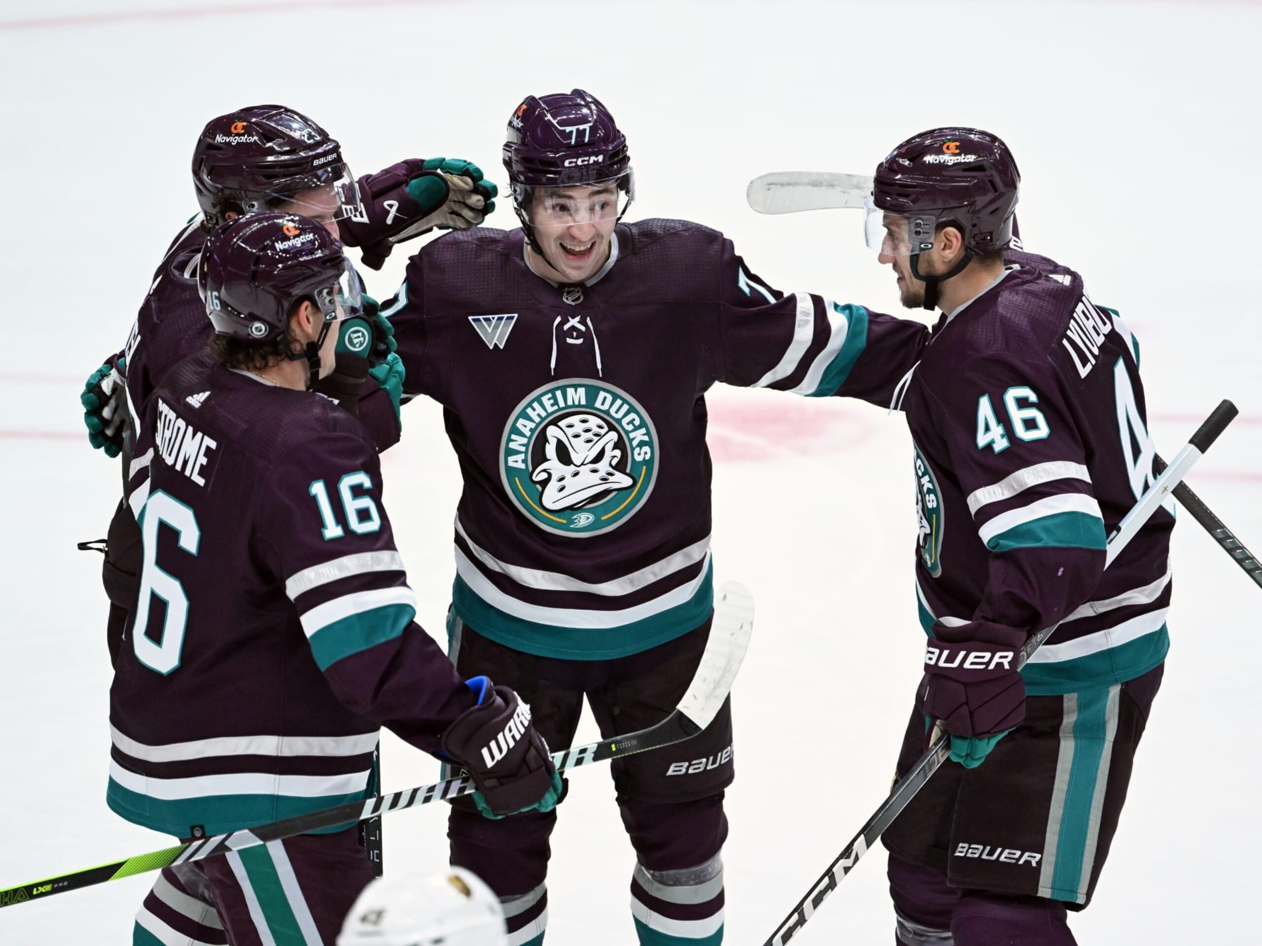ANAHEIM, CA - DECEMBER 27: Anaheim Ducks left wing Frank Vatrano (77) celebrates on the ice with his teammates after Vatrano scored a goal during the first period of an NHL hockey game against the Vegas Golden Knights played on December 27, 2023 at the Honda Center in Anaheim, CA. (Photo by John Cordes/Icon Sportswire via Getty Images)
