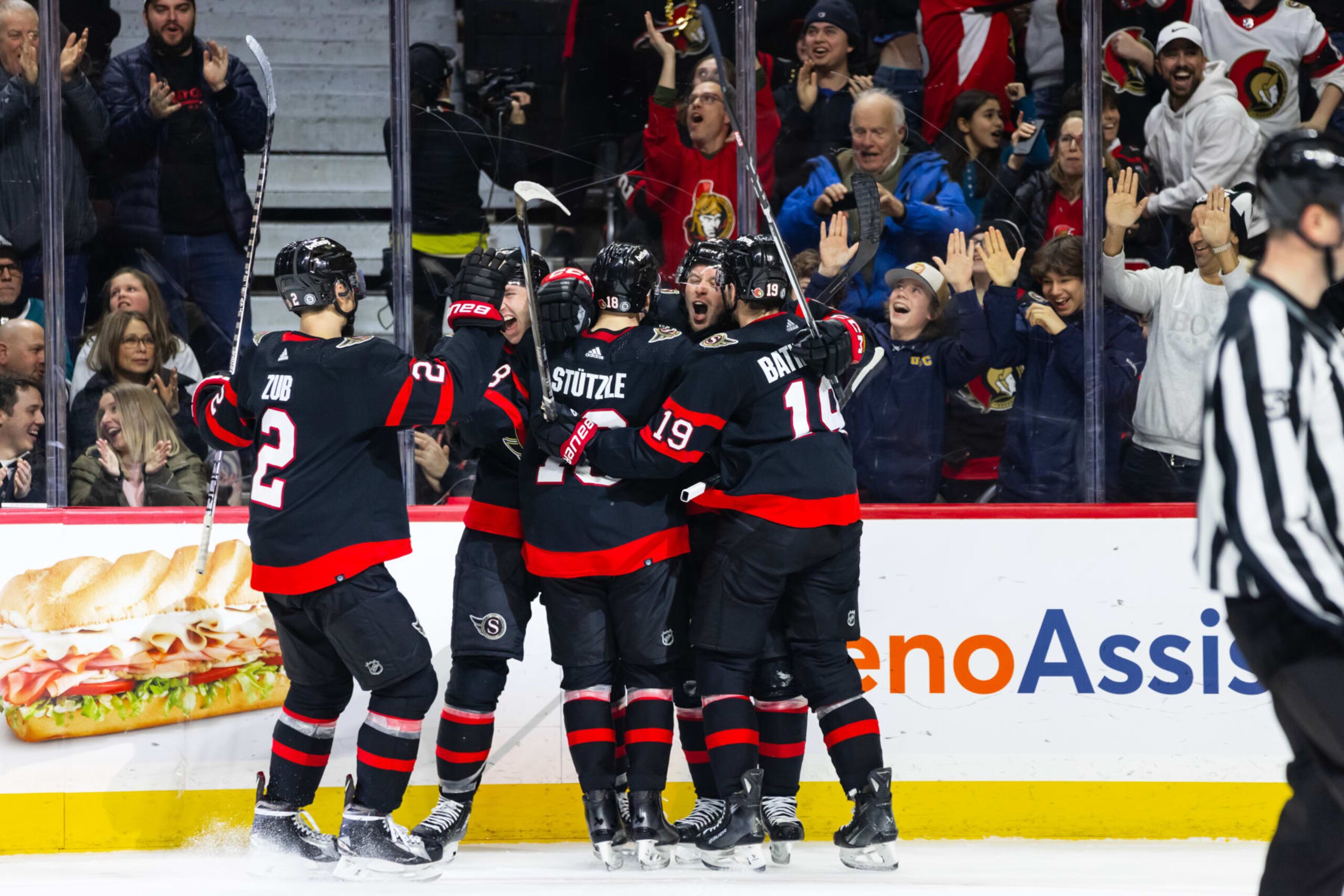 OTTAWA, ON - JANUARY 13: Ottawa Senators Right Wing Vladimir Tarasenko (91) celebrates his game-winning goal teammates Defenceman Artem Zub (2), Defenceman Jake Sanderson (85), Center Tim Stutzle (18), Right Wing Drake Batherson (19) during third period National Hockey League action between the San Jose Sharks and Ottawa Senators on January 13, 2024, at Canadian Tire Centre in Ottawa, ON, Canada. (Photo by Richard A. Whittaker/Icon Sportswire via Getty Images)