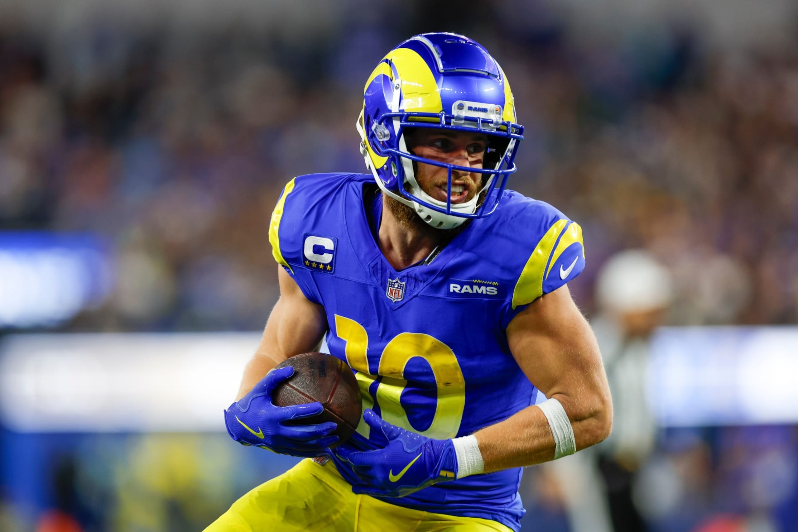 INGLEWOOD, CA - DECEMBER 21: Los Angeles Rams wide receiver Cooper Kupp (10) runs with the ball in the first half during an NFL regular season game between the New Orleans Saints and the Los Angeles Rams on December 21, 2023, at SoFi Stadium in Inglewood, CA. (Photo by Brandon Sloter/Icon Sportswire via Getty Images)