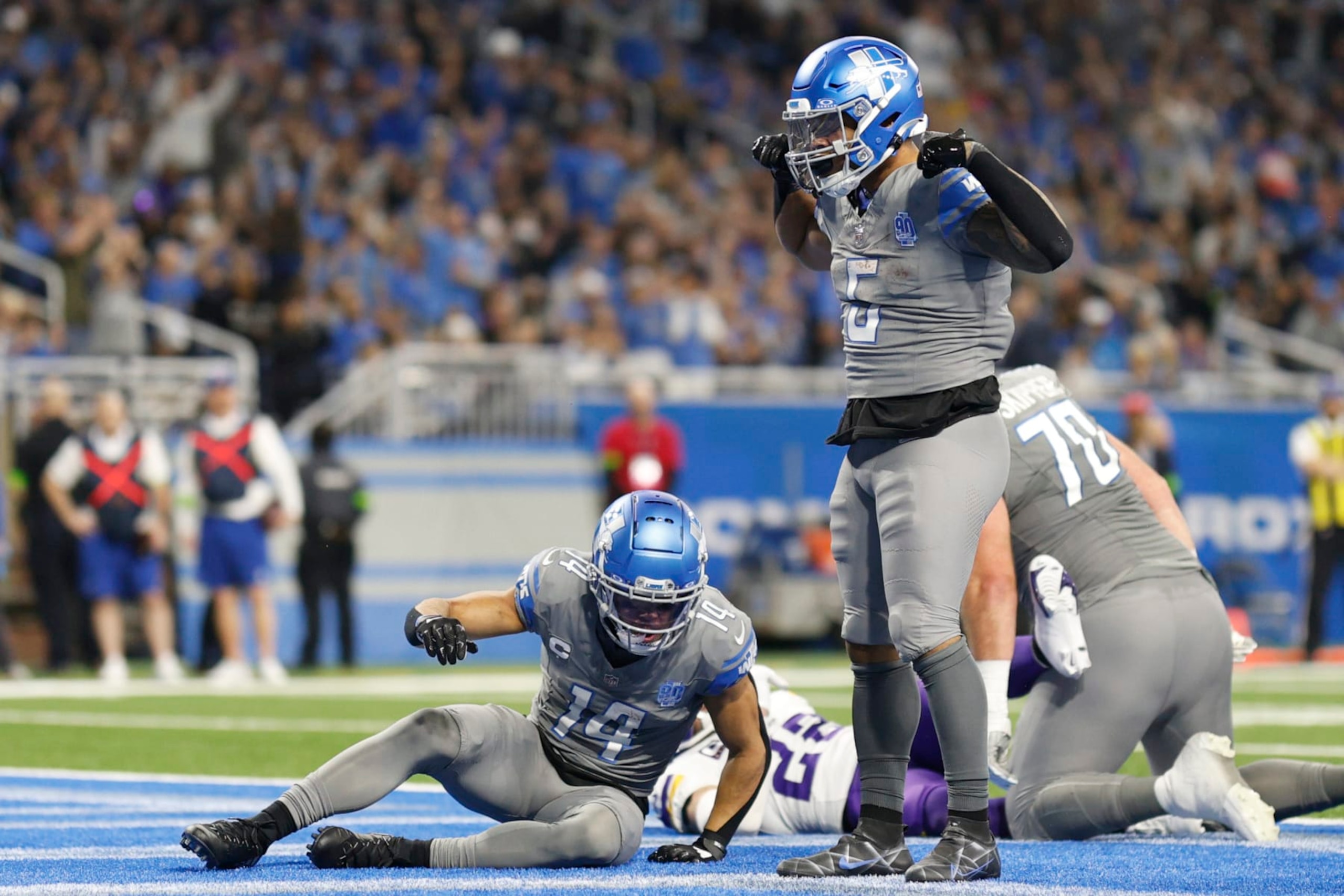 DETROIT, MICHIGAN - JANUARY 07: David Montgomery #5 of the Detroit Lions celebrates after a touchdown during the third quarter in the game against the Minnesota Vikings at Ford Field on January 07, 2024 in Detroit, Michigan. (Photo by Mike Mulholland/Getty Images)