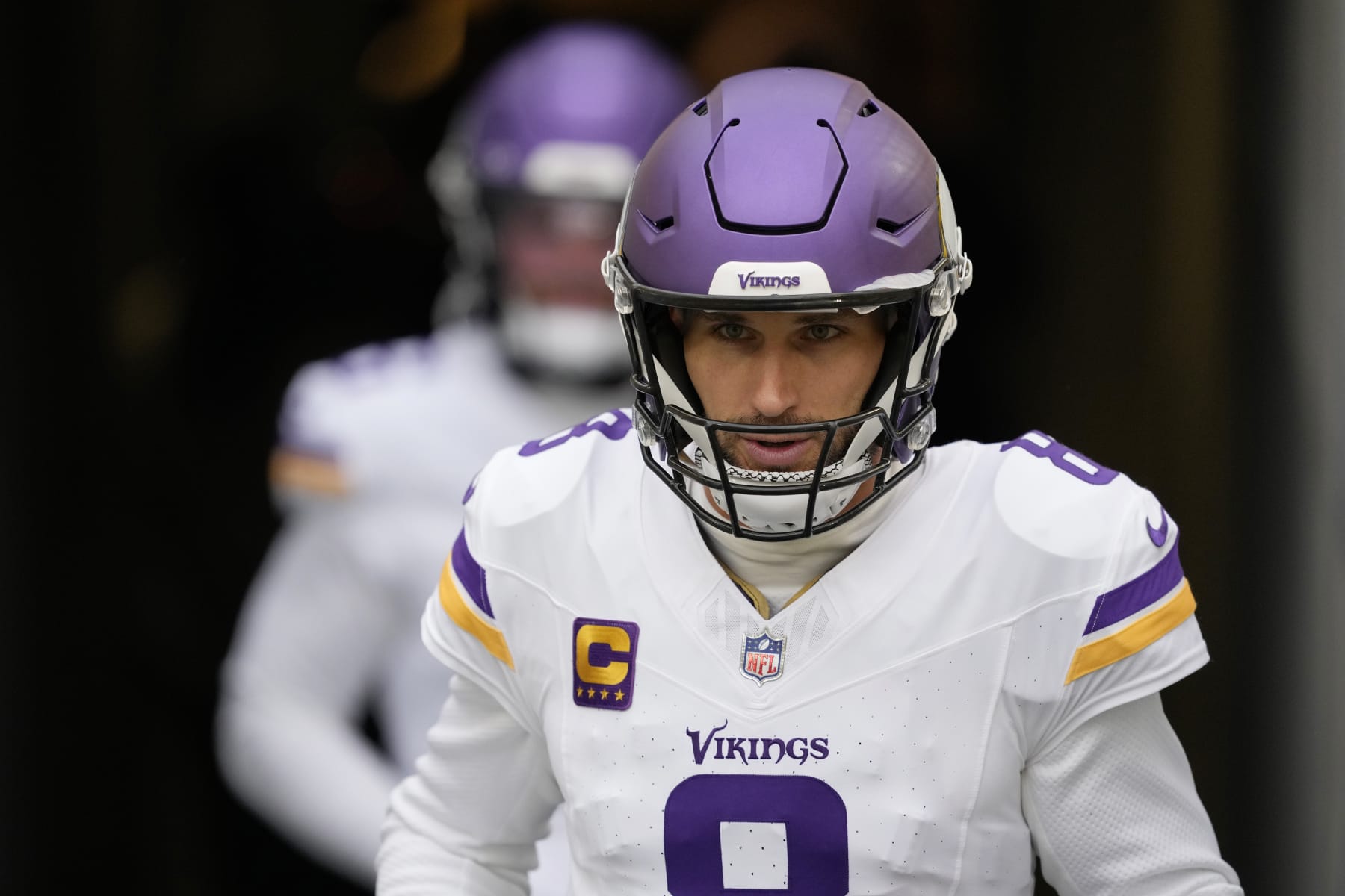 GREEN BAY, WISCONSIN - OCTOBER 29: Kirk Cousins #8 of the Minnesota Vikings runs onto the field before a game against the Green Bay Packers at Lambeau Field on October 29, 2023 in Green Bay, Wisconsin. (Photo by Patrick McDermott/Getty Images)