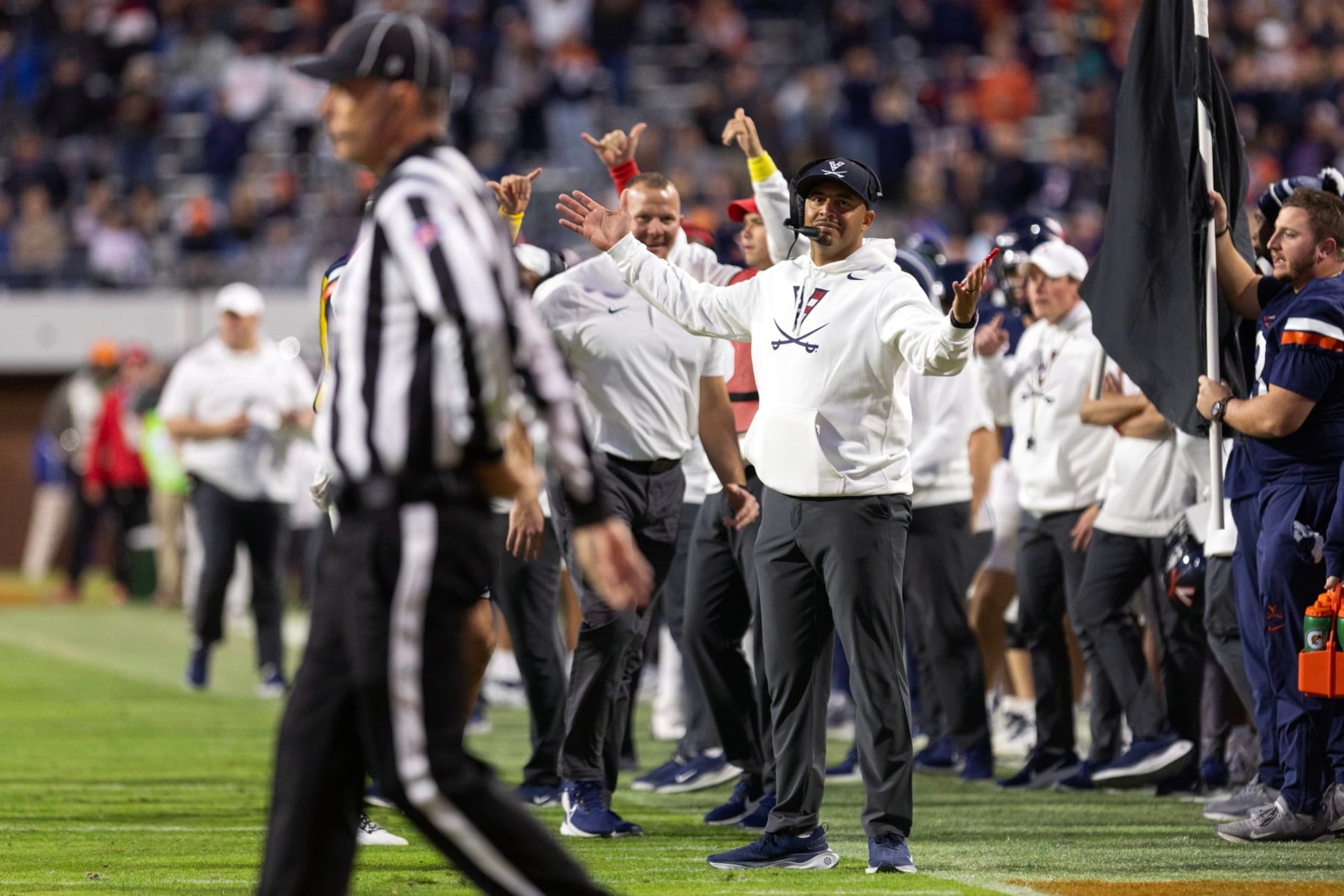 CHARLOTTESVILLE, VIRGINIA - NOVEMBER 18: Head coach Tony Elliott of the Virginia Cavaliers gestures toward referee John Hoffman in the second half during a game against the Duke Blue Devils at Scott Stadium on November 18, 2023 in Charlottesville, Virginia. (Photo by Ryan M. Kelly/Getty Images)