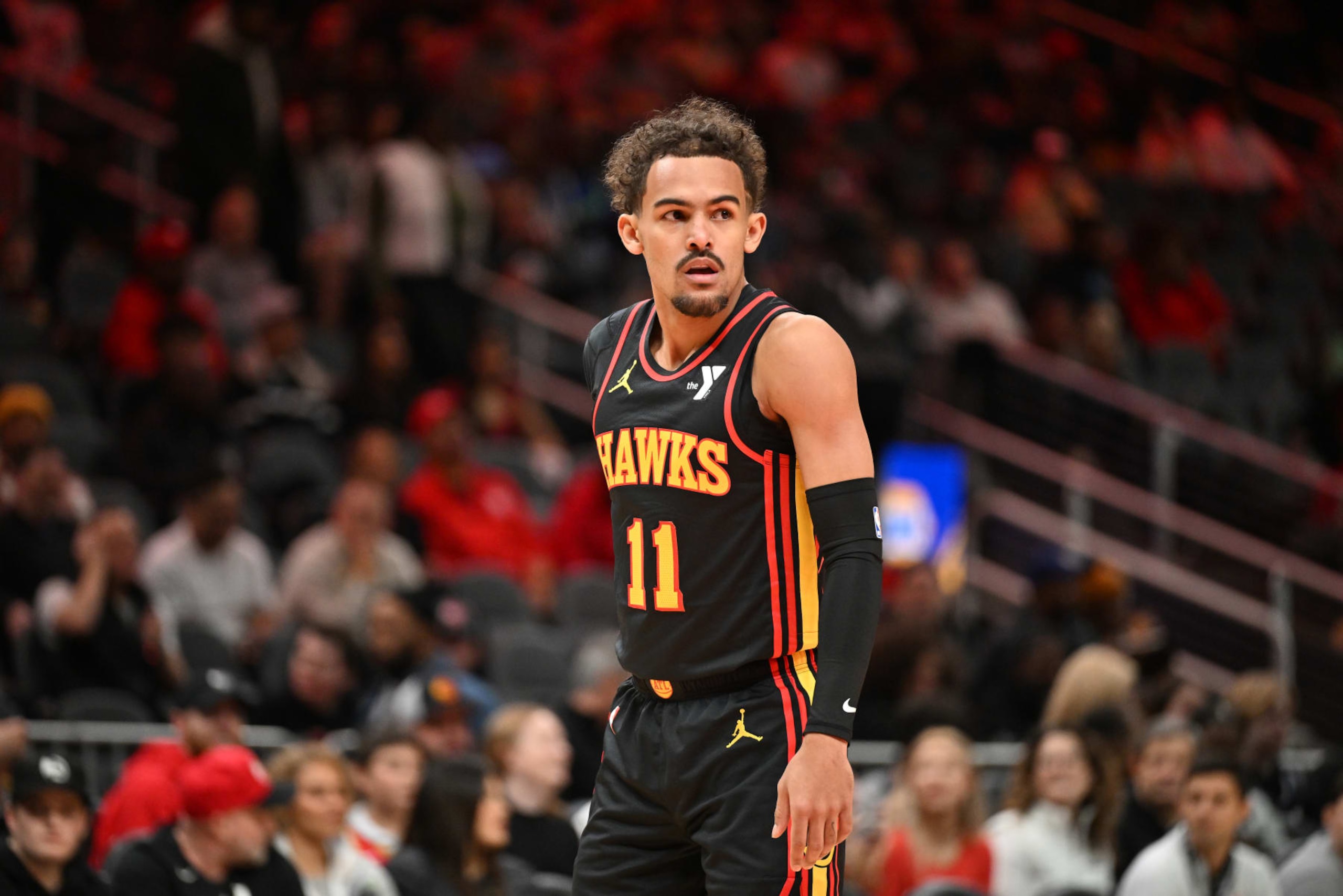 ATLANTA, GEORGIA - JANUARY 12: Trae Young #11 of the Atlanta Hawks looks on during the game against the Indiana Pacers on January 12, 2024 at State Farm Arena in Atlanta, Georgia. NOTE TO USER: User expressly acknowledges and agrees that, by downloading and or using this photograph, User is consenting to the terms and conditions of the Getty Images License Agreement. (Photo by Paras Griffin/Getty Images) ATLANTA, GEORGIA - JANUARY 12: Trae Young #11 of the Atlanta Hawks looks on during the game against the Indiana Pacers on January 12, 2024 at State Farm Arena in Atlanta, Georgia. NOTE TO USER: User expressly acknowledges and agrees that, by downloading and or using this photograph, User is consenting to the terms and conditions of the Getty Images License Agreement. (Photo by Paras Griffin/Getty Images)
