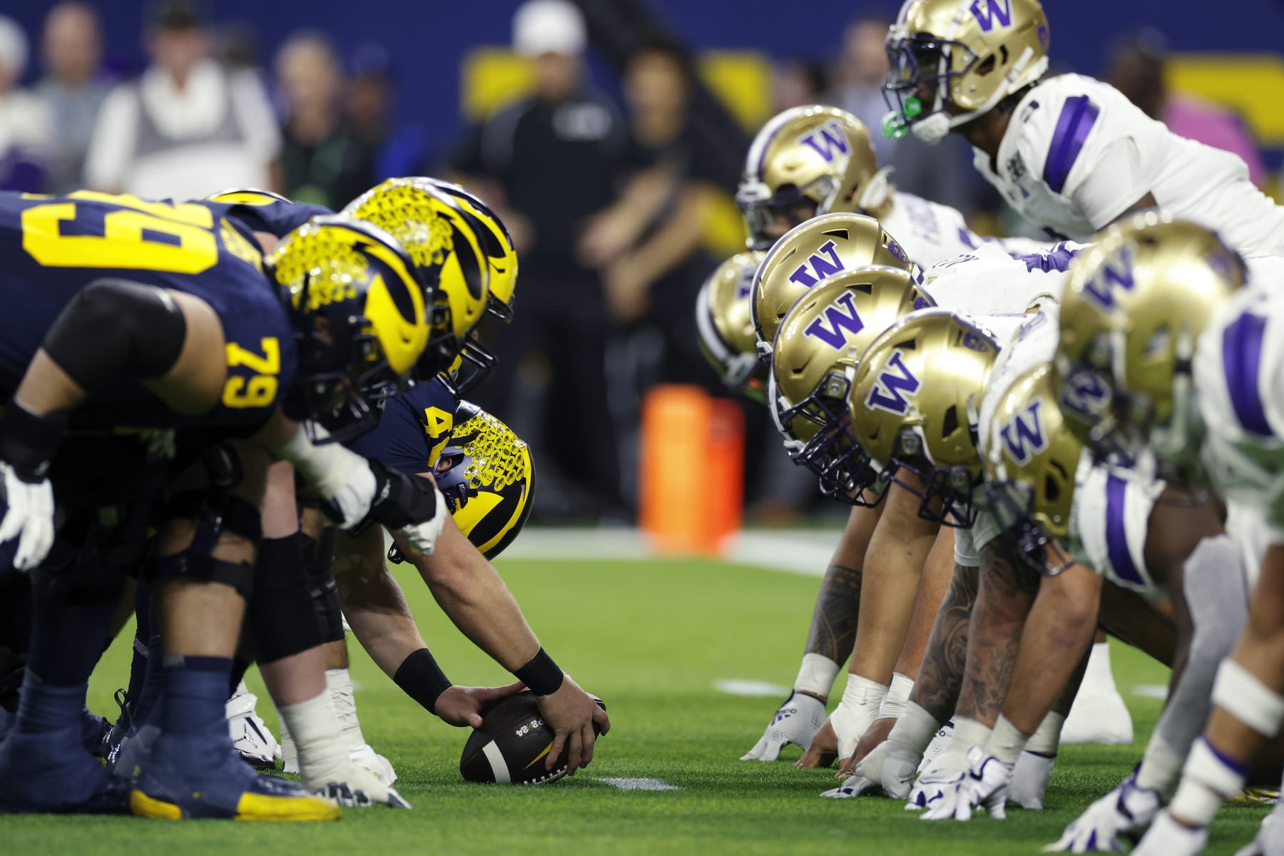 HOUSTON, TX - JANUARY 08: Michigan Wolverines line up at the line of scrimmage against the Washington Huskies during the CFP National Championship on January 08, 2024 at NRG Stadium in Houston, Texas. (Photo by Joe Robbins/Icon Sportswire via Getty Images)