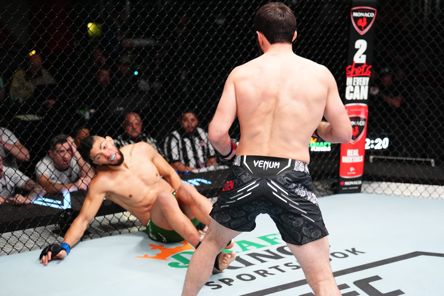 Magomed Ankalaev knocks out Johnny Walker in a light heavyweight fight.