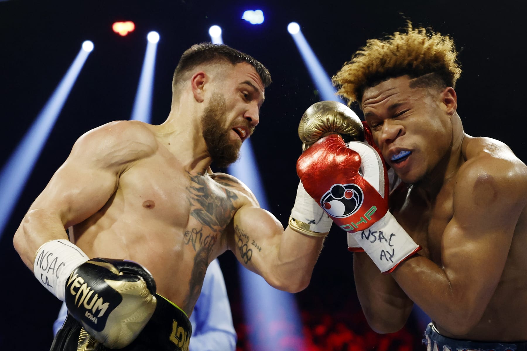 LAS VEGAS, NEVADA - MAY 20: Devin Haney exchanges punches with Vasyl Lomachenko of Ukraine during their undisputed lightweight title bout at MGM Grand Garden Arena on May 20, 2023 in Las Vegas, Nevada. (Photo by Sarah Stier/Getty Images)