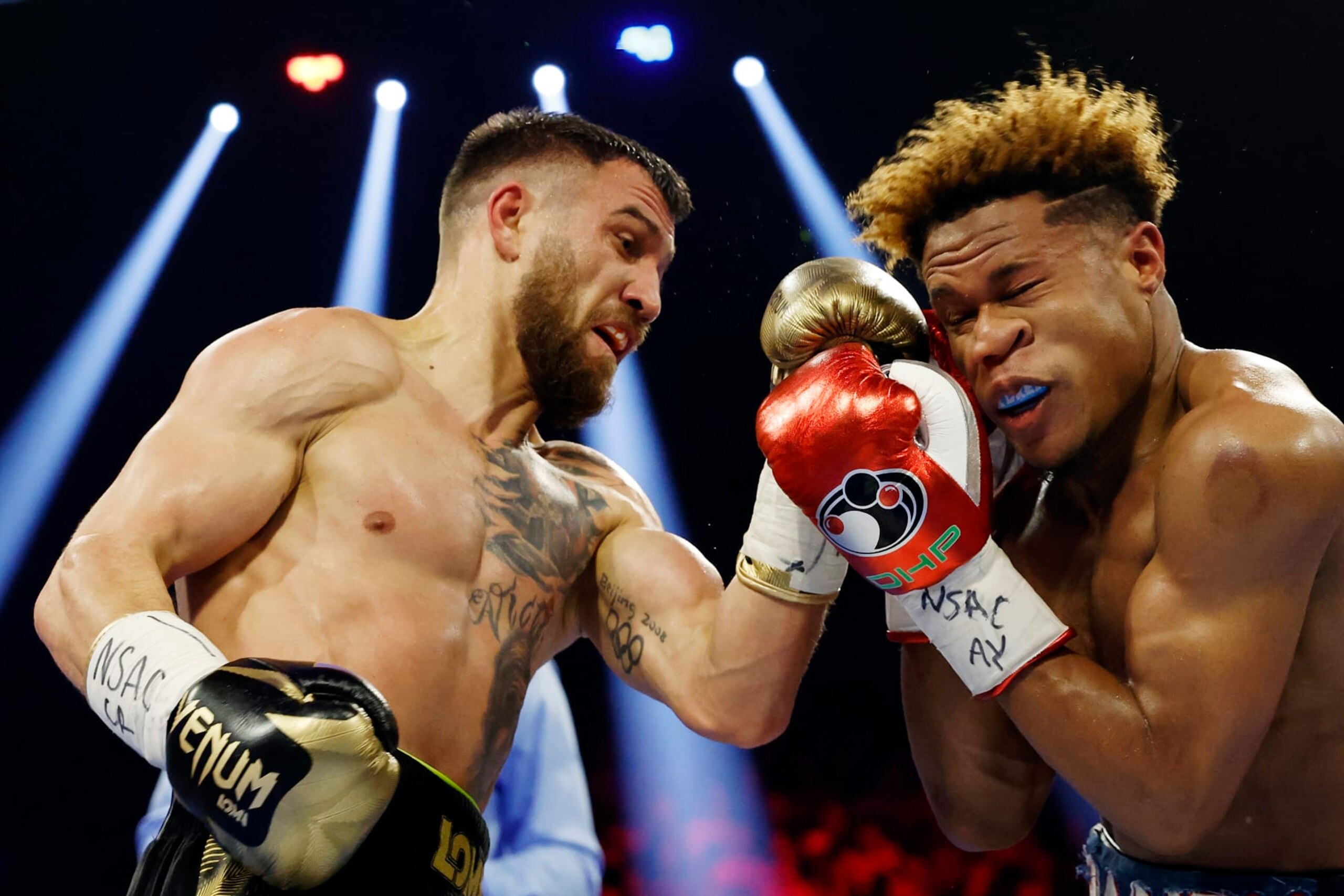 LAS VEGAS, NEVADA - MAY 20: Devin Haney exchanges punches with Vasyl Lomachenko of Ukraine during their undisputed lightweight title bout at MGM Grand Garden Arena on May 20, 2023 in Las Vegas, Nevada. (Photo by Sarah Stier/Getty Images)