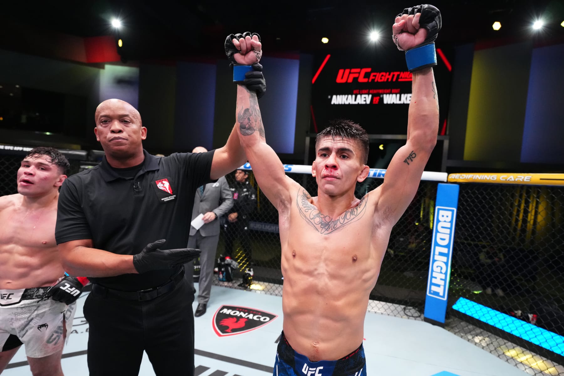 Mario Bautista reacts after his victory against Ricky Simon.