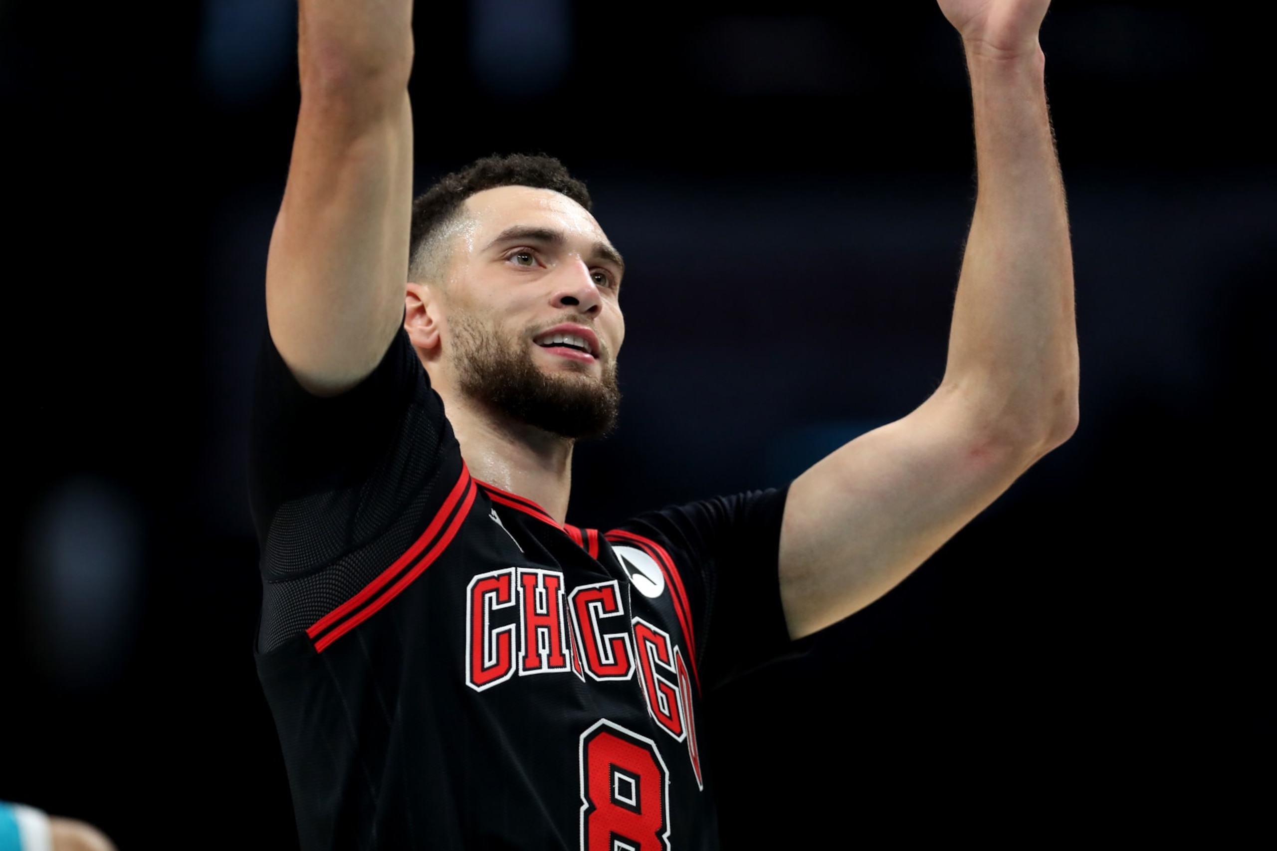 CHARLOTTE, NORTH CAROLINA - JANUARY 08: Zach LaVine #8 of the Chicago Bulls shoots a free throw during the first half against the Charlotte Hornets at Spectrum Center on January 08, 2024 in Charlotte, North Carolina. NOTE TO USER: User expressly acknowledges and agrees that, by downloading and or using this photograph, User is consenting to the terms and conditions of the Getty Images License Agreement. (Photo by David Jensen/Getty Images)