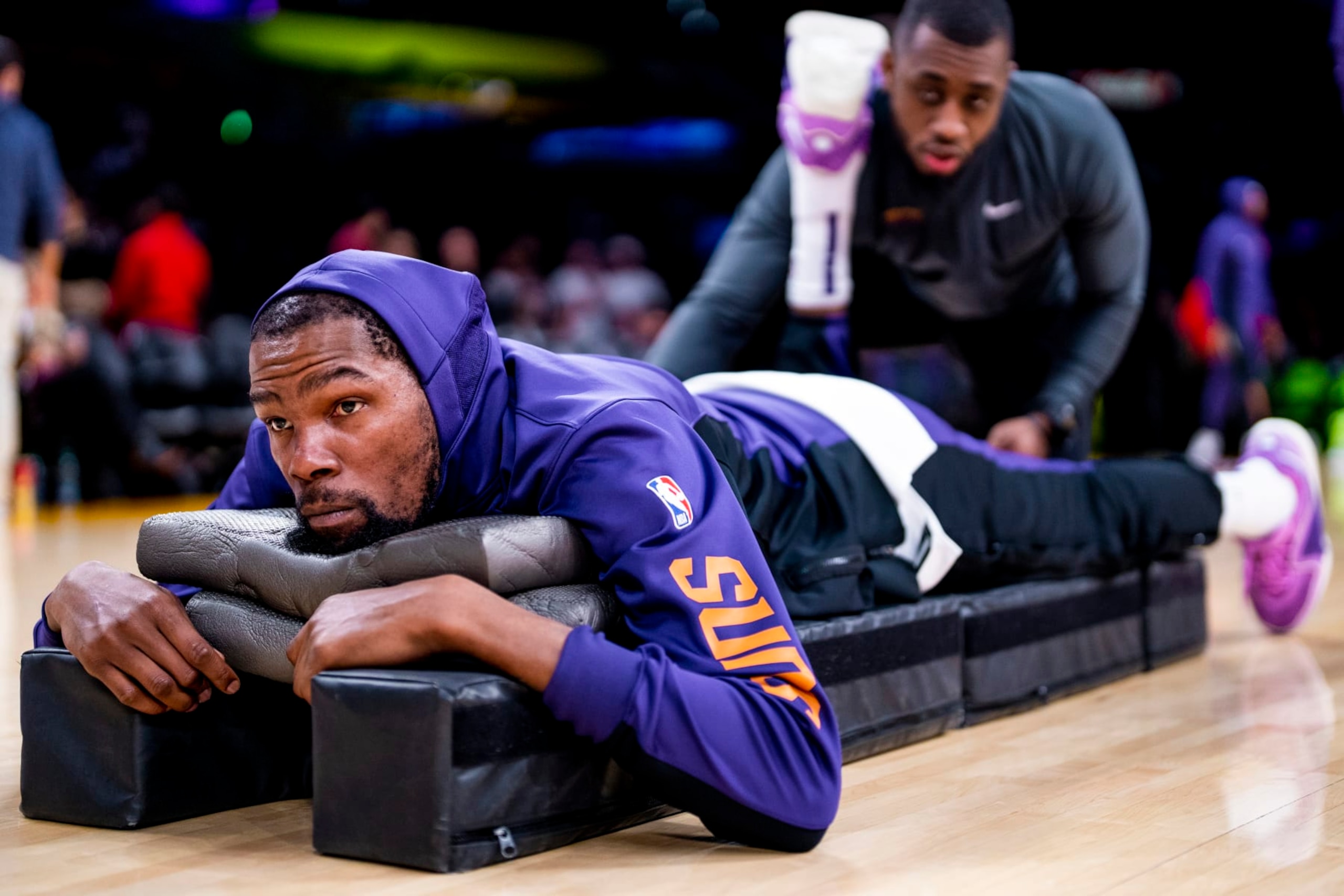 LOS ANGELES, CA - JANUARY 11: Kevin Durant #35 of the Phoenix Suns stretches before the game against the Los Angeles Lakers on January 11, 2024 at Crypto.Com Arena in Los Angeles, California. NOTE TO USER: User expressly acknowledges and agrees that, by downloading and/or using this Photograph, user is consenting to the terms and conditions of the Getty Images License Agreement. Mandatory Copyright Notice: Copyright 2024 NBAE (Photo by Tyler Ross/NBAE via Getty Images)