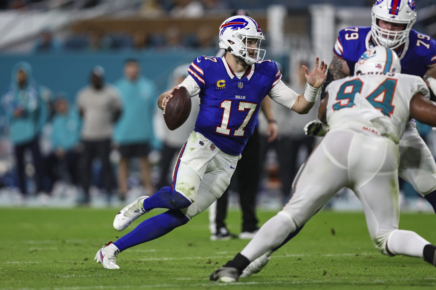 MIAMI GARDENS, FL - JANUARY 07: Josh Allen #17 of the Buffalo Bills scrambles out of the pocket during an NFL football game against the Miami Dolphins at Hard Rock Stadium on January 7, 2024 in Miami Gardens, Florida. (Photo by Perry Knotts/Getty Images) MIAMI GARDENS, FL - JANUARY 07: Josh Allen #17 of the Buffalo Bills scrambles out of the pocket during an NFL football game against the Miami Dolphins at Hard Rock Stadium on January 7, 2024 in Miami Gardens, Florida. (Photo by Perry Knotts/Getty Images)